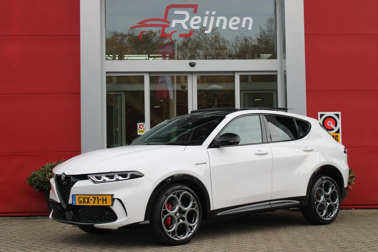 Alfa Romeo Tonale 1.5T 160PK Hybrid VELOCE | PANORAMISCH SCHUIF/KANTEL DAK | PREMIUM PACK: LEDEREN BEKLEDING/GEVENTILEERDE VOORSTOELEN/4-VOUDIG ELEKTRISCH VERSTELBARE LENDESTEUN VOORSTOELEN/HOOGGLANS ZWARTE RAAMOMLIJSTING/AMBIENT LIGHTING | TECHNOLOGY PACK: PARKEERWAARSCHU