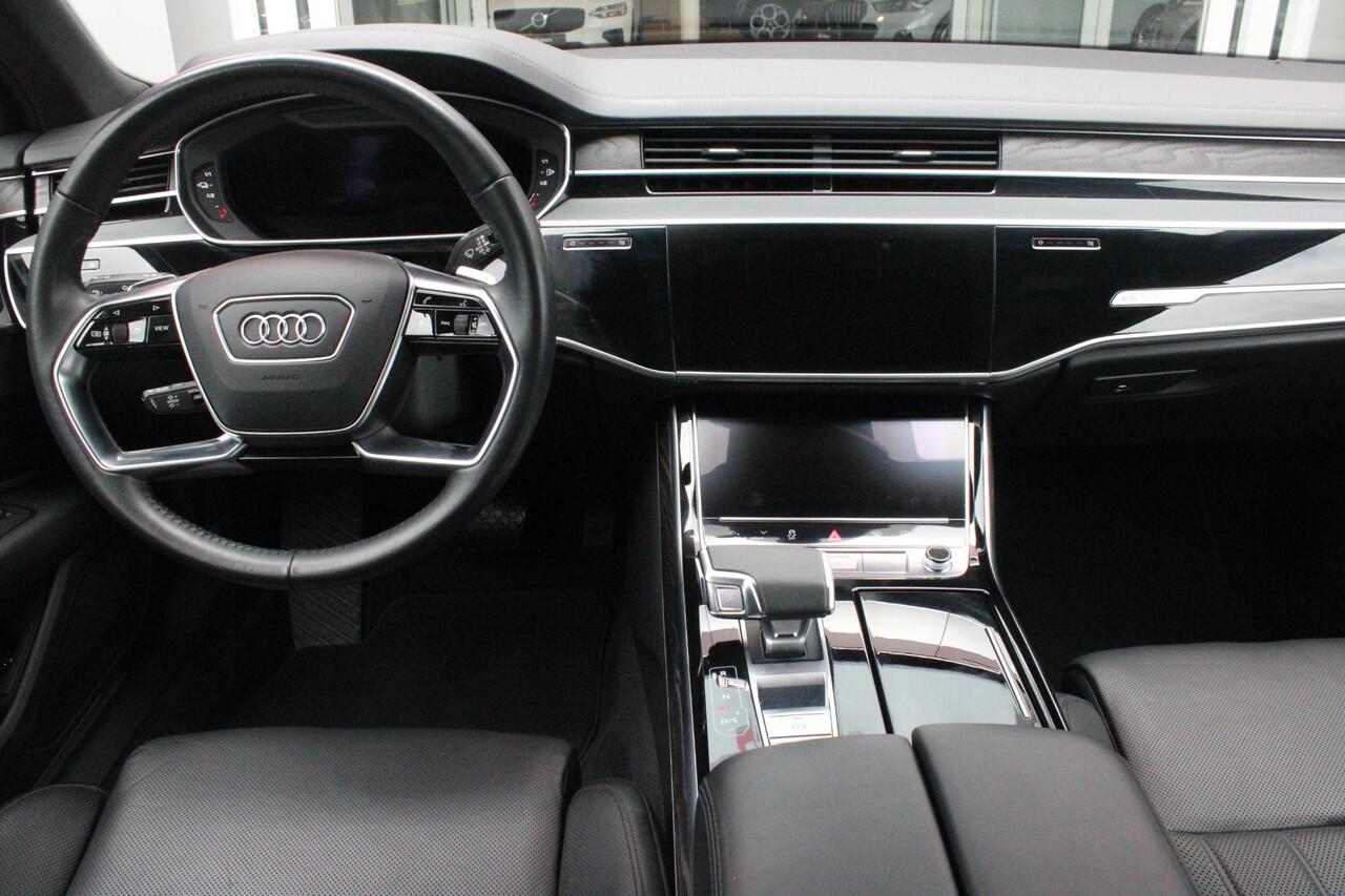 Audi A8 60 TFSI 450PK e-HYBRID QUATTRO PRO LINE PLUS | PANORAMISCH SCHUIF/KANTEL DAK | STUUR/STOEL VERWARMING | ELEKTRISCH BEDIENBAAR STUURKOLOM | SFEER VERLICHTING | COMFORT HOOFDSTEUNEN | LICHTMETALEN VELGEN 20" | BANG & OLUFSEN SOUND SYSTEM | SERVOSLUITING VOO