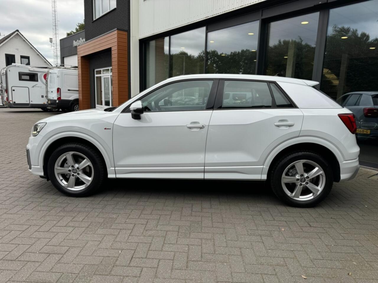 Audi Q2 35 TFSI 150pk 2x S-Line,LED,Half Leer,Clima,Cruise,Stoelverw,Nav