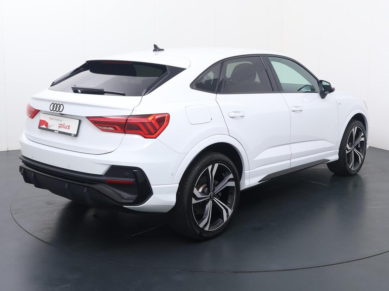 Audi Q3 Sportback 45 TFSI e S Edition | 245 PK | SoH 91% | Adaptive cruise control | Navigatiesysteem | Voorstoelen verwarmd | S line | 20" LM velgen |