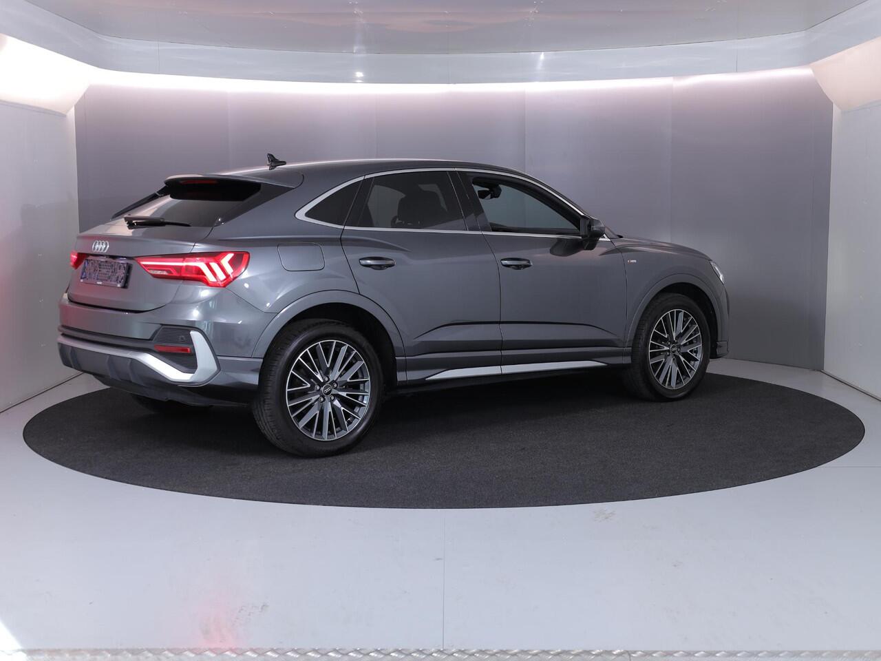 Audi Q3 Sportback 45 TFSI e S Edition 245pk | 87% SOH | Private lease vanaf ¤800,- | Elektrisch verstelbare voorstoelen | Parkeeercamera | Verwarmbare voorstoelen | Navigatie