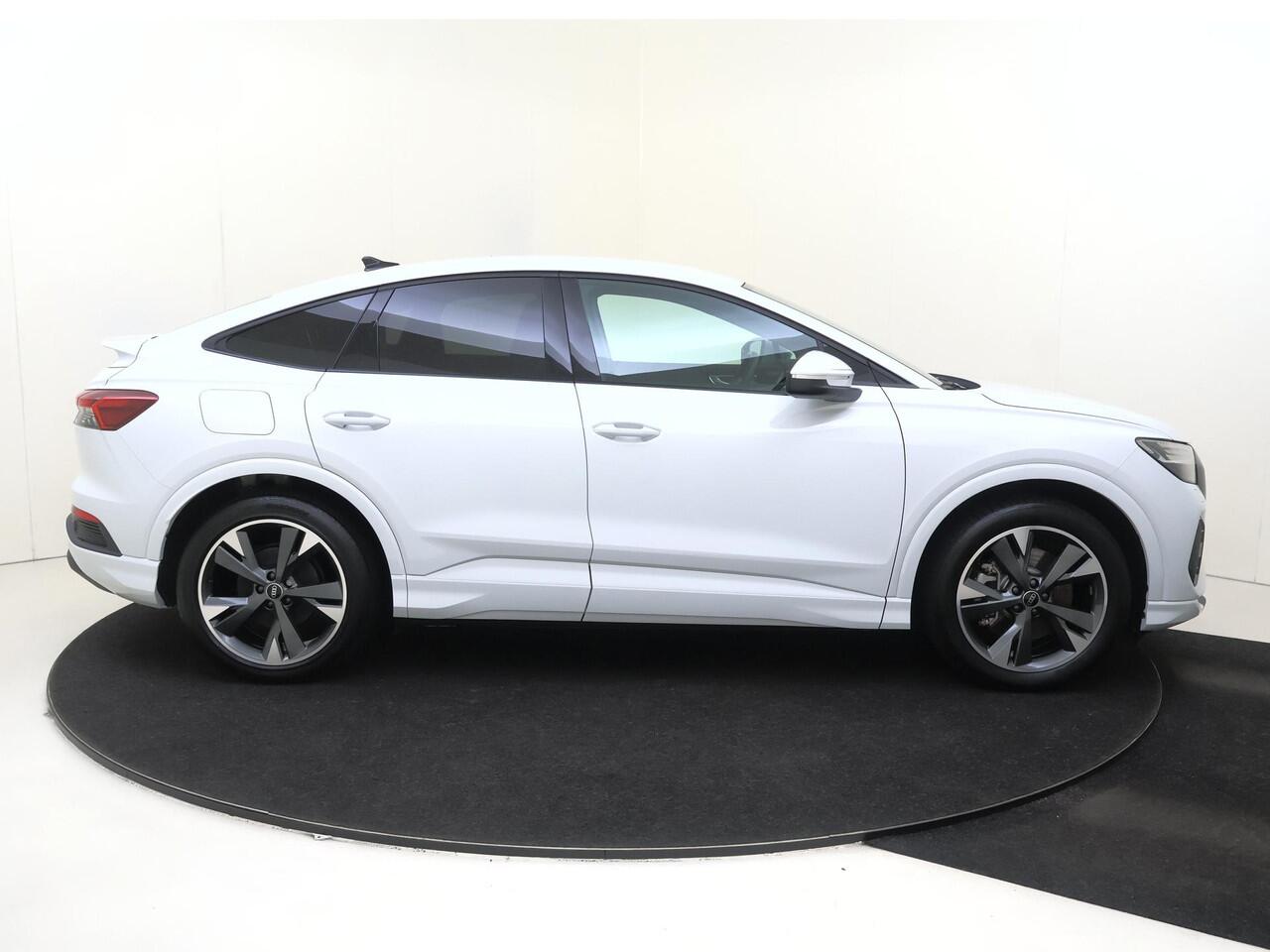 Audi Q4 Sportback e-tron 40 Advanced edition 77 kWh | SoH 96% | Trekhaak | Navigatie Plus | LED matrix verlichting | Stoelverwarming | CarPlay | Cruise control | Elektrische achterklep |