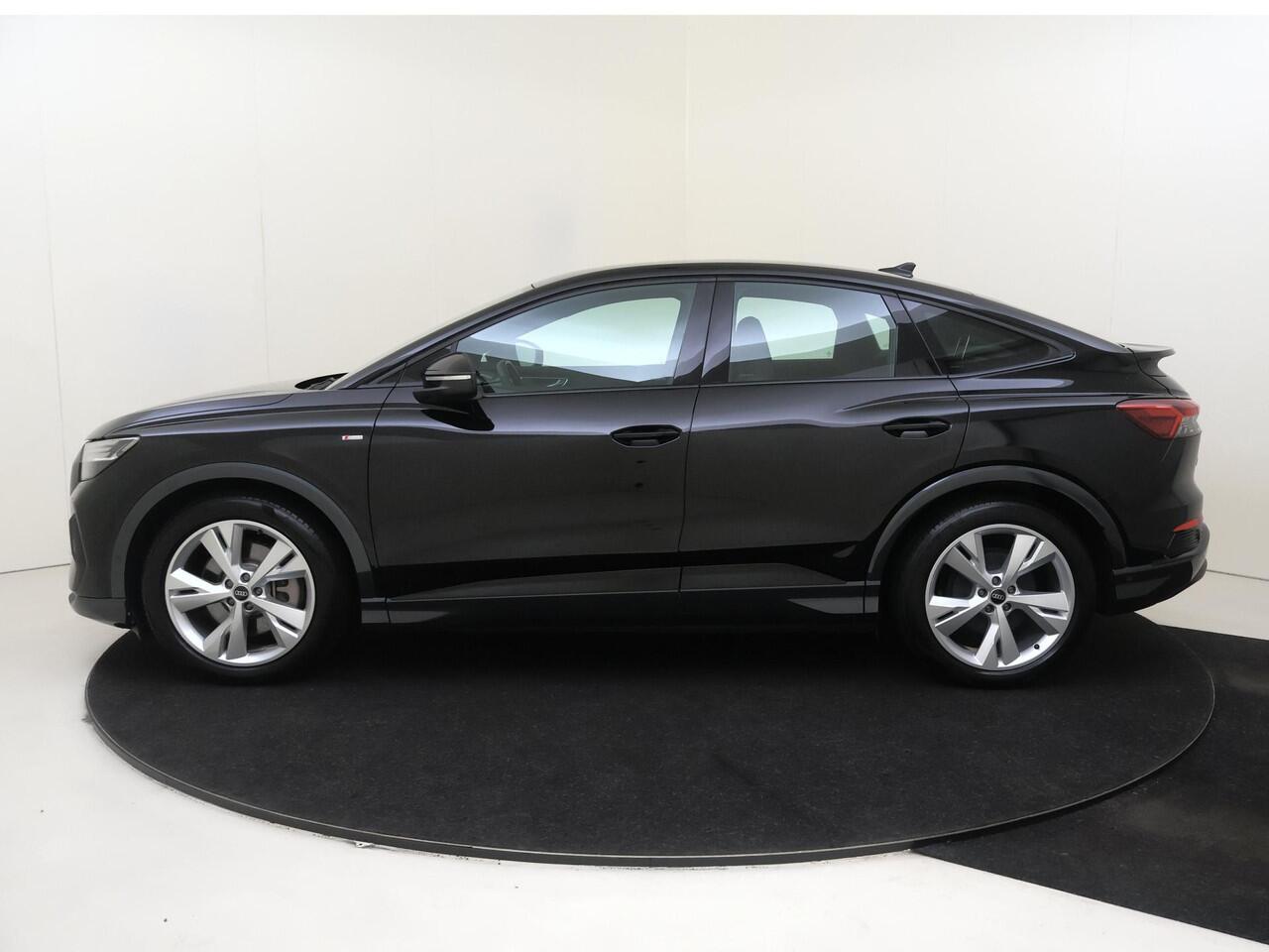 Audi Q4 Sportback e-tron 45 quattro S edition 77 kWh | SoH 90% | Head-up display | Keyless | Leder/alcantara bekleding | SONOS audio | Achteruitrijcamera | Adaptieve cruise control | Navigatie Plus | LED matrix verlichting |