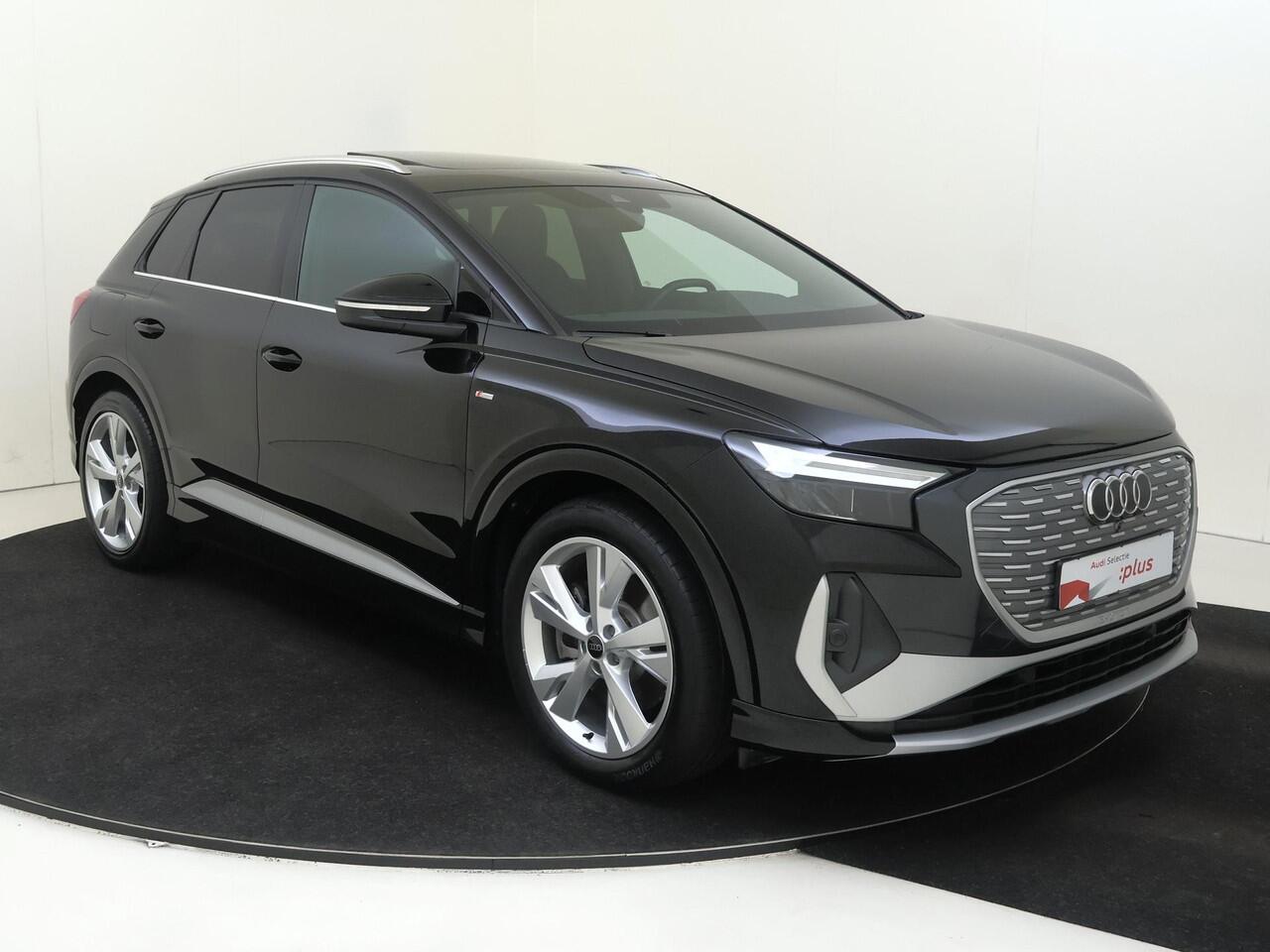 Audi Q4 e-tron 45 S Edition 82 kWh | Panoramadak | Adaptieve cruise control | Achteruitrijcamera | Stoelverwarming | Elektrische achterklep | Navigatie Plus | Warmtepomp |