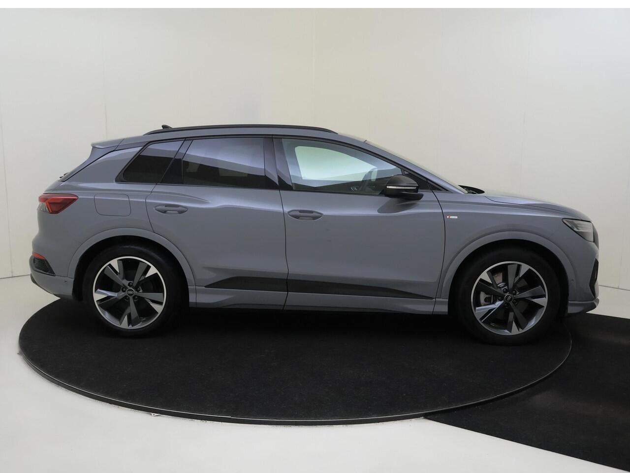 Audi Q4 e-tron 40 S edition 77 kWh | S-line in- en exterieur | Optiekpakket zwart | Elek. inklapbare buitenspiegels | Navigatie | Achteruitrijcamera