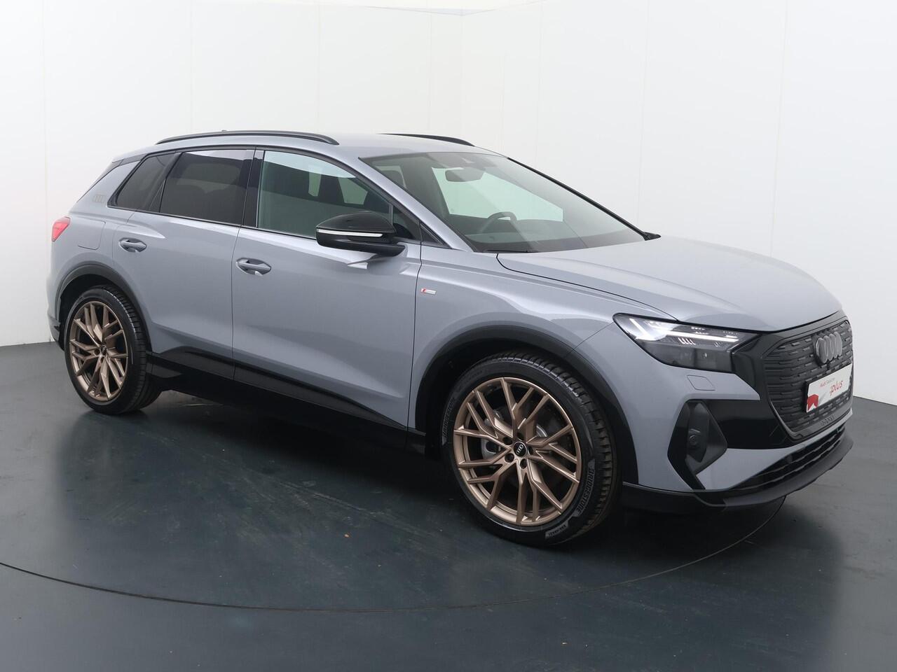Audi Q4 e-tron 45 S Edition 82 kWh | 286 PK | SoH 100% | Adaptive cruise control | 21"LM velgen | Keyless | S line | Stoelverwarming |