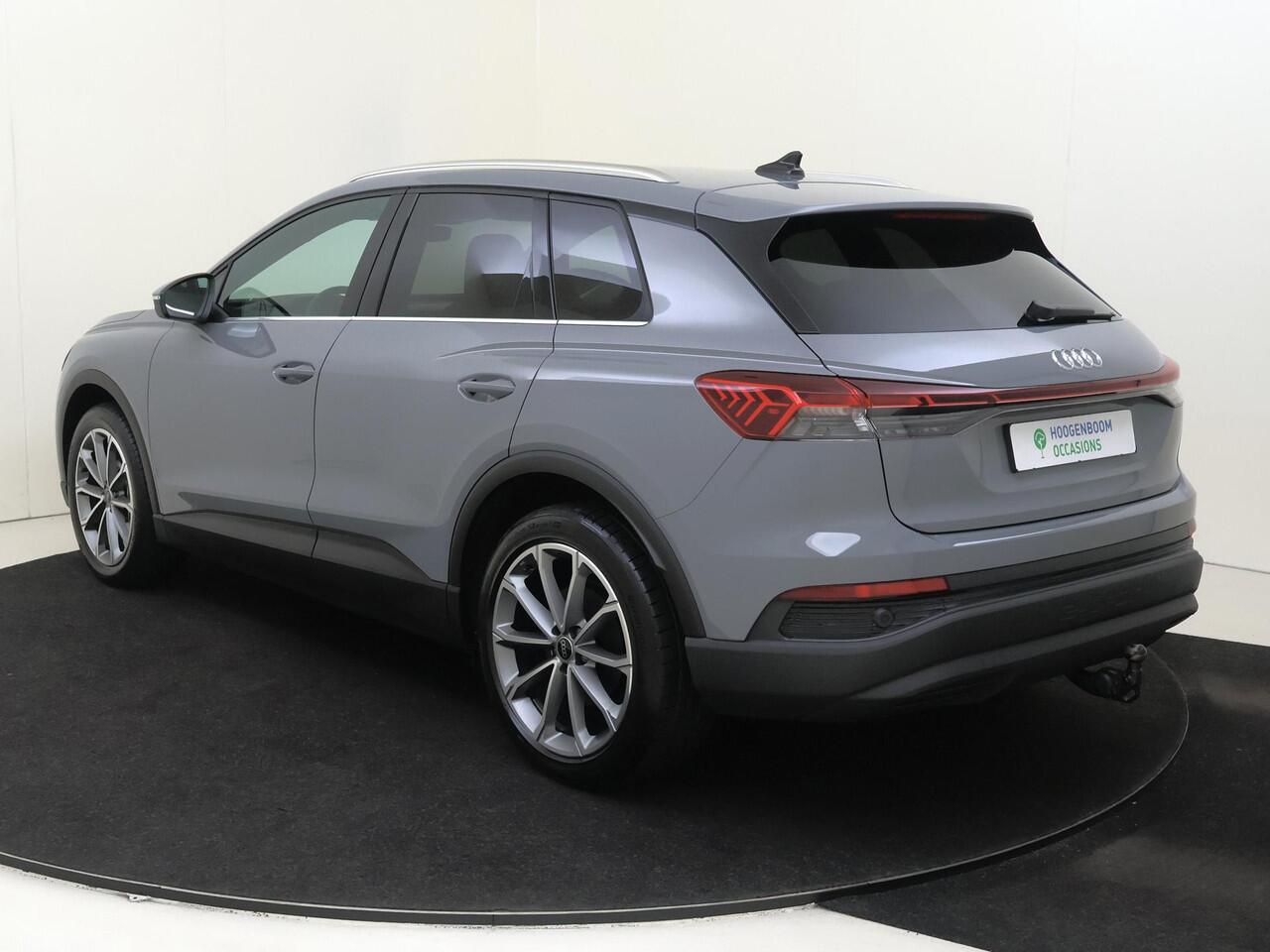 Audi Q4 e-tron 45 Advanced edition 82 kWh | SoH 100% | Trekhaak | 3-zone airco | Keyless | Adaptieve cruise control | Parkeersensoren | CarPlay | Navigatie | Stoelverwarming |