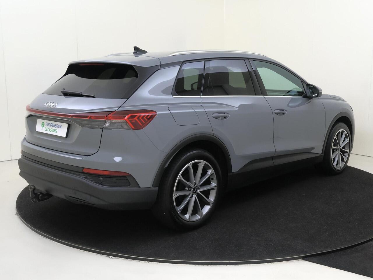 Audi Q4 e-tron 45 Advanced edition 82 kWh | SoH 100% | Trekhaak | 3-zone airco | Keyless | Adaptieve cruise control | Parkeersensoren | CarPlay | Navigatie | Stoelverwarming |