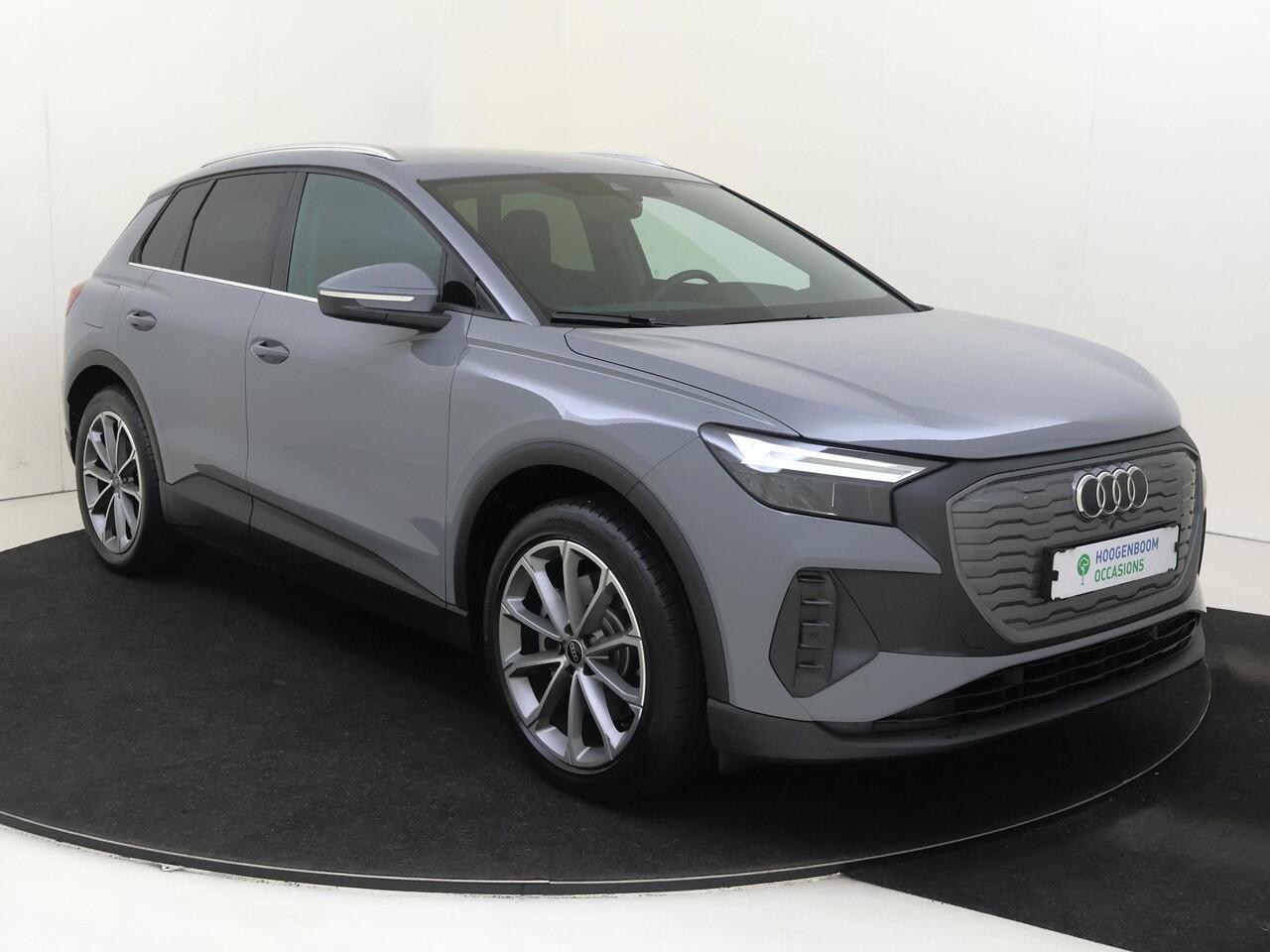 Audi Q4 e-tron 45 Advanced edition 82 kWh | SoH 100% | Trekhaak | 3-zone airco | Keyless | Adaptieve cruise control | Parkeersensoren | CarPlay | Navigatie | Stoelverwarming |