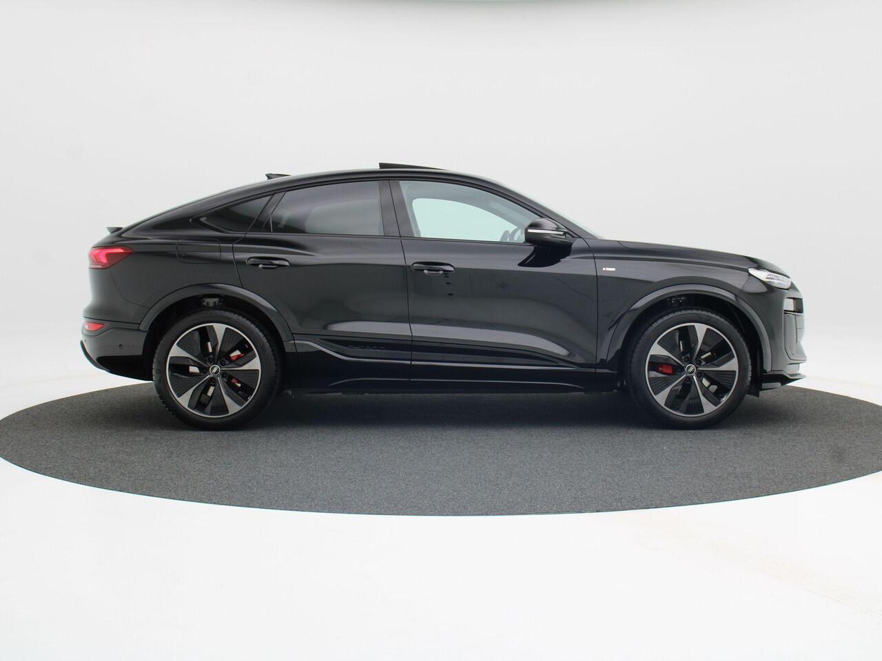 Audi Q6 Sportback S edition e-tron 55 100 kWh | 388 PK | 21 inch velgen | Privacyglas | Zwart optiek | Glazen Panoramadak | Rode remzadels |