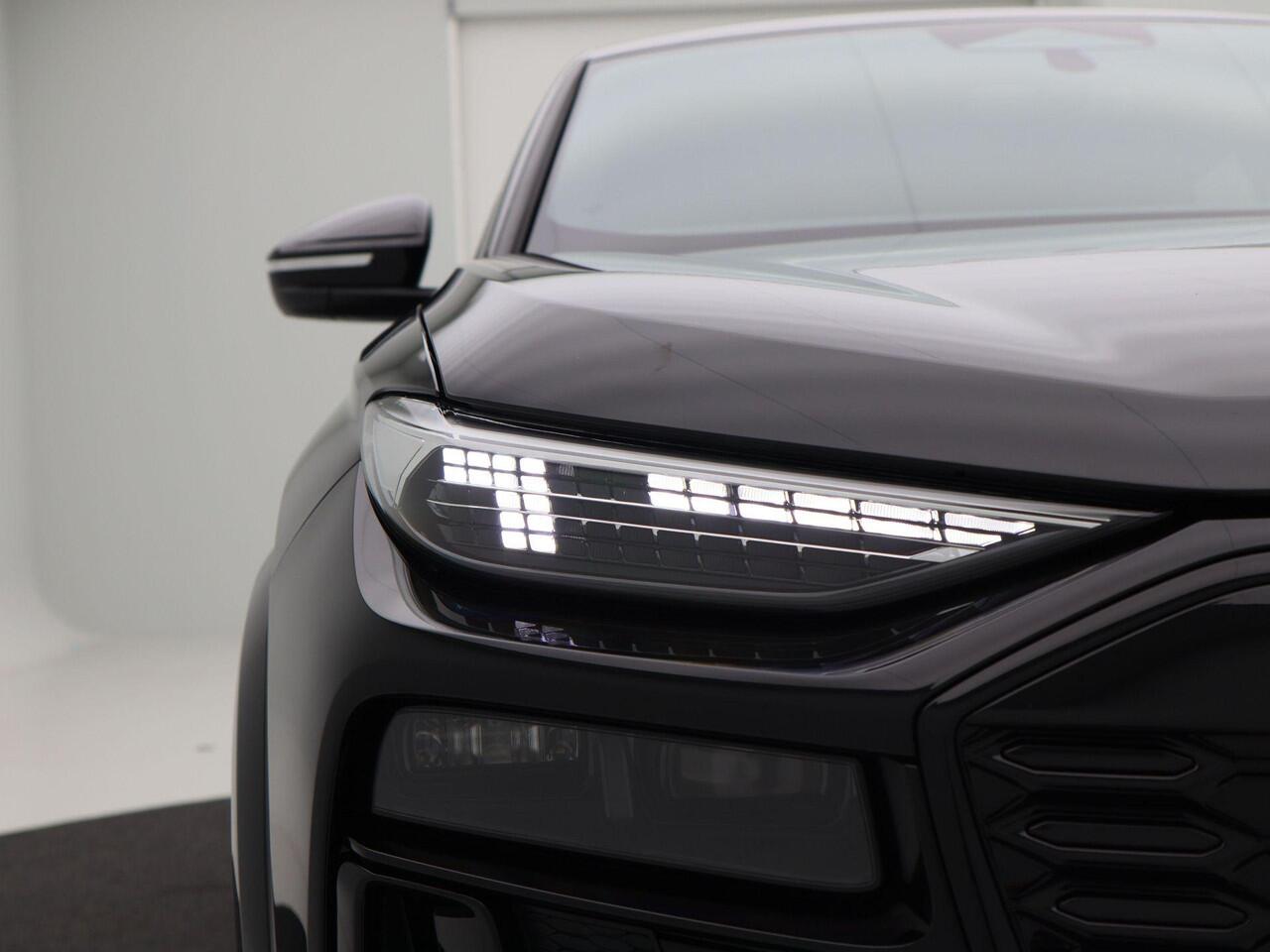 Audi Q6 Sportback S edition e-tron 55 100 kWh | 388 PK | 21 inch velgen | Privacyglas | Zwart optiek | Glazen Panoramadak | Rode remzadels |