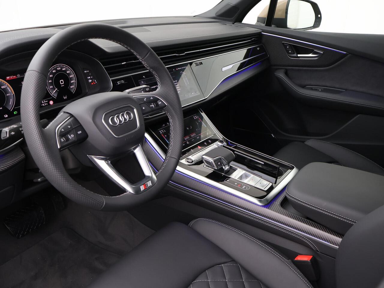 Audi Q7 Pro Line S 55 TFSI e quattro tiptronic | 394 PK | SoH 95% | B&O Sound Systeem | Trekhaak Wegklapbaar | Stuurwielverwarming | Stoelverwarming | Memory Seats | Carbon Decor Inleg | Keyless Entry | Adaptieve Cruise Control |
