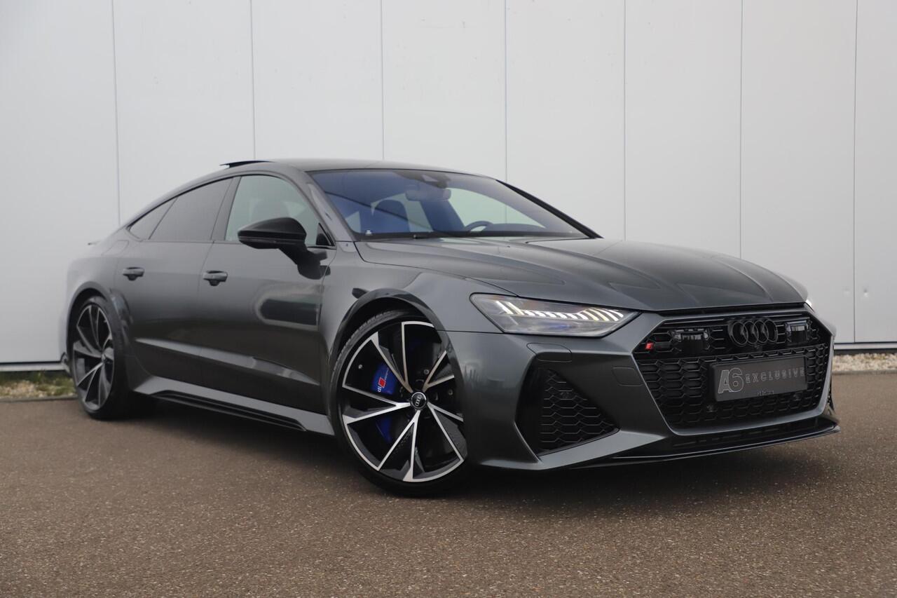 Audi RS7 4.0 TFSI RS 7 Sportback Quattro 600PK Fabrieksgarantie 22 inch Keramisch B&O High End Alcantara Hemel Dynamic Plus Pack 4-wiel Sturing Softclose Stoelverkoeling Panoramadak Laser LED HUD 360 Camera Full Options! Nieuwstaat!