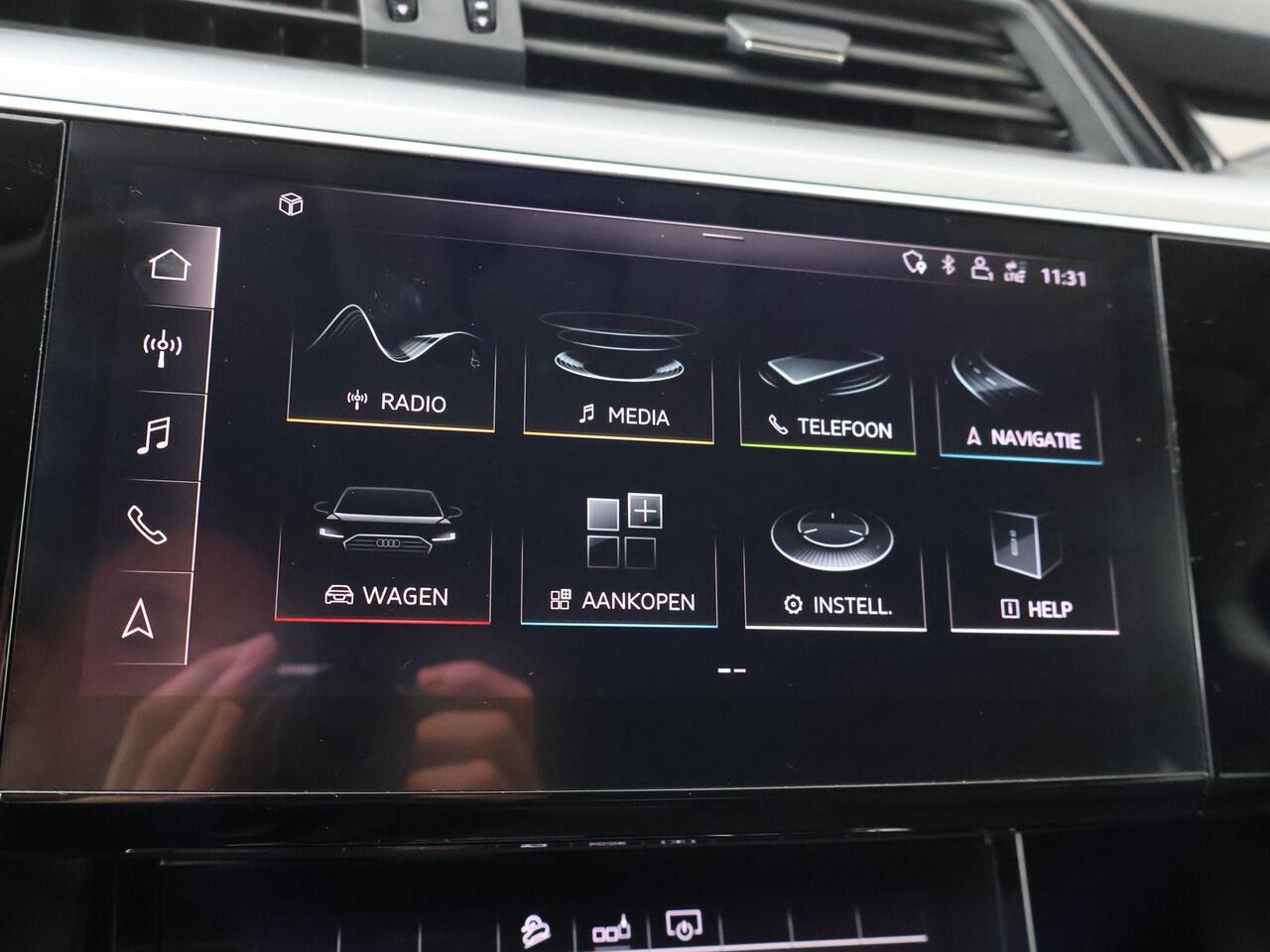 Audi e-tron 50 quattro Business edition 71 kWh | 313 PK | SoH 100% | Adaptive cruise control | Navigatiesysteem | Elek. achterklep |