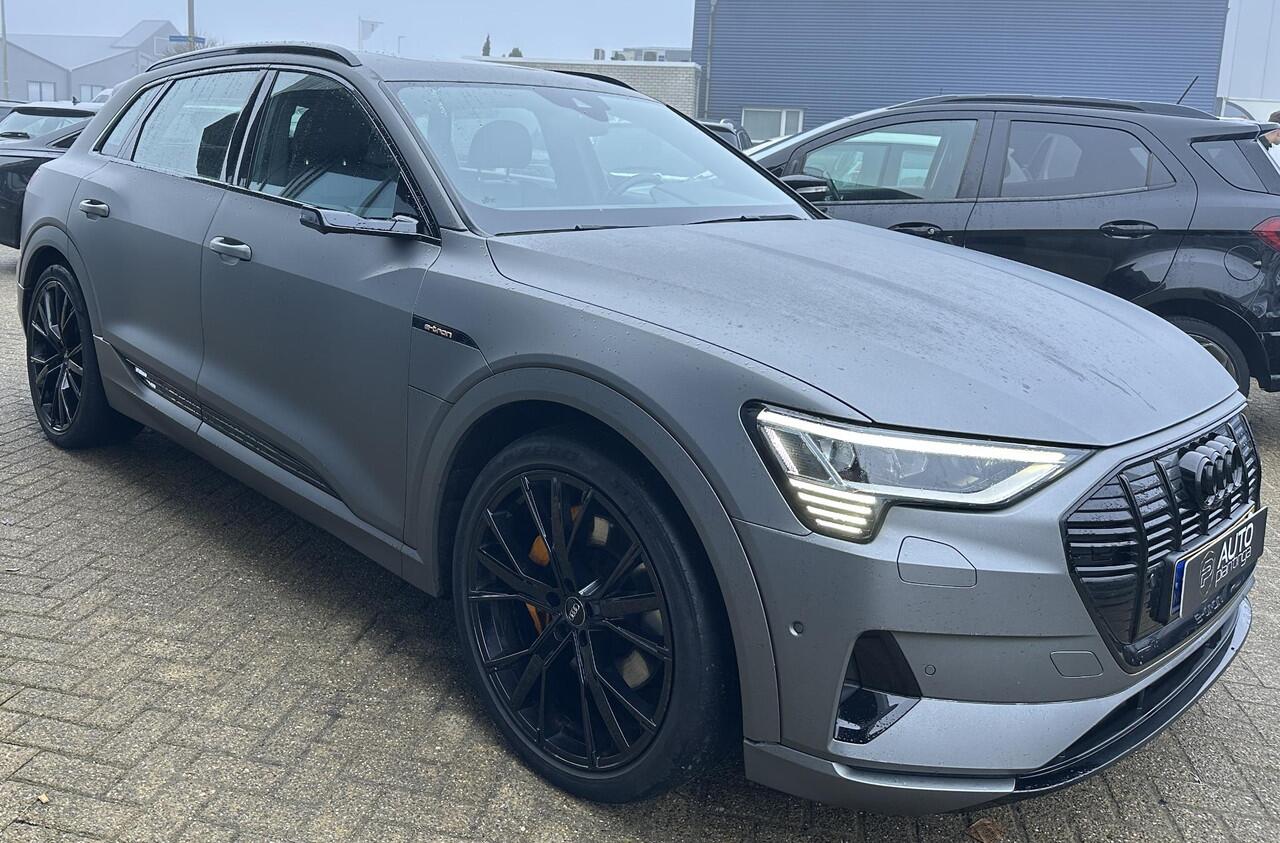 Audi e-tron e-tron 55 quattro 95 kWh BOMVOL | SOH 89% | DEALERONDERHOUDEN | PANO | Audi Virtual Mirrors | Virtual Cockpit | Lederen Sportstoelen | Elektrische Stoel | B&O | 360 Camera | 2 Sleutels | Betreft een Wrap, Originele kleur is Antigua Blue Metallic |
