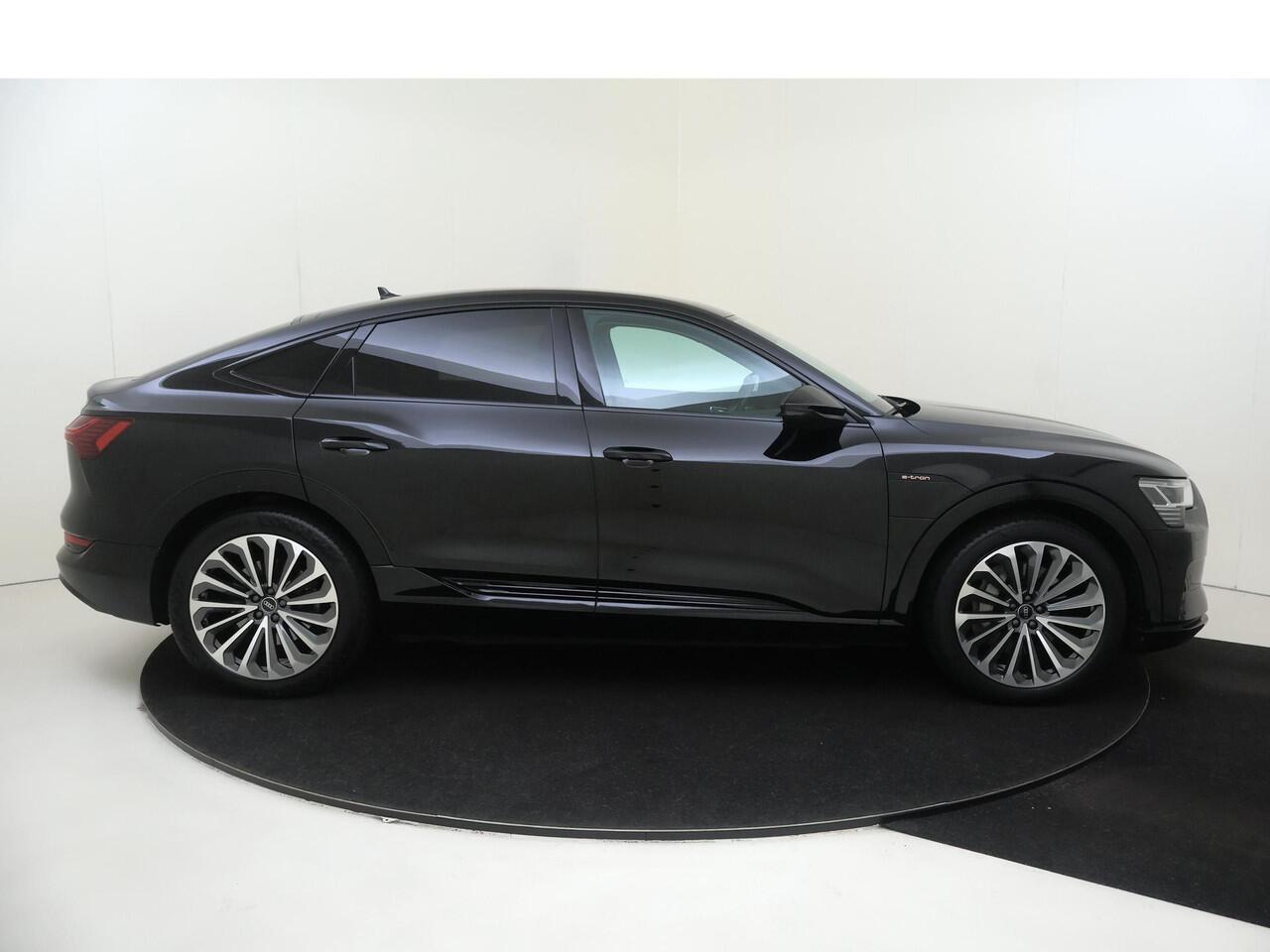 Audi e-tron 55 quattro S edition 95 kWh | SoH 100% | Luchtvering | Parkeerassistent | Navigatie Plus | Achteruitrijcamera | Stoelverwarming | Cruise control | CarPlay |