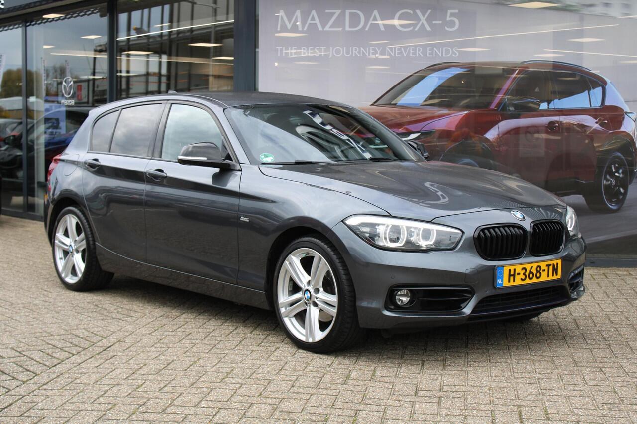 BMW 1-SERIE 120i Sport Line 184PK , Trekhaak, Navi, PDC, Cruise, Bluetooth, LMV 18 Inch, Stoelverwarming