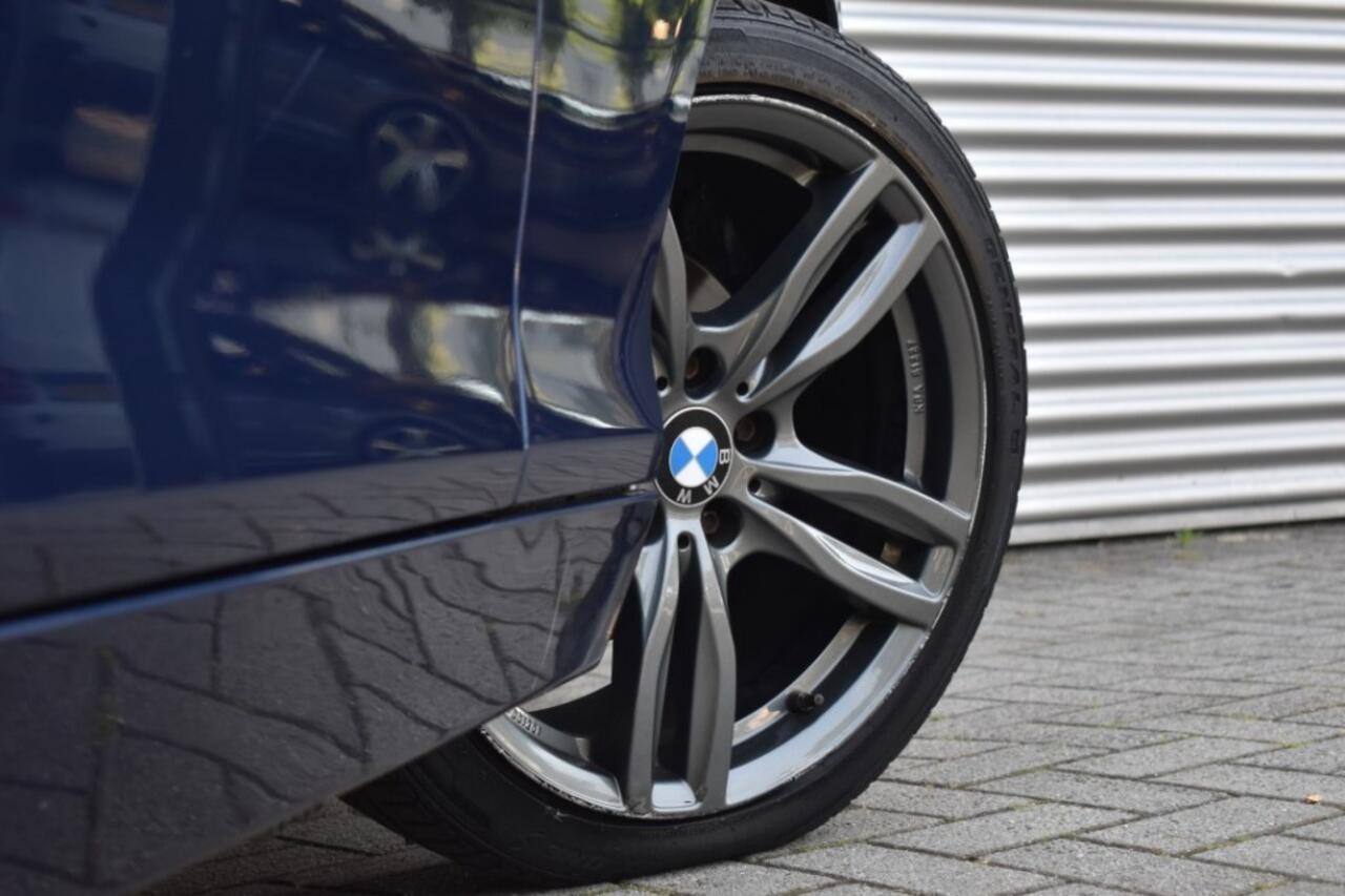 BMW 1-SERIE 116I 5DRS. / 18inch M SPORT / APPLE CARPLAY + NAVI / P.CAM + PDC V+A