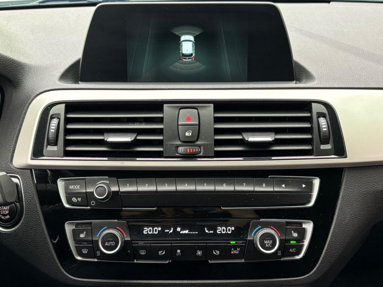 BMW 1-SERIE 118I EXECUTIVE AUT. NAVI AIRCO CRUISE STOELVERW