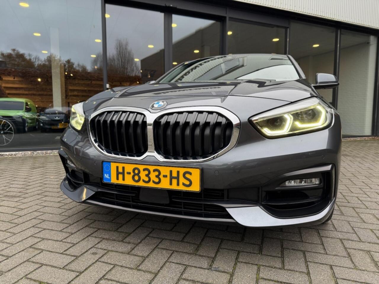 BMW 1-SERIE 118I Sportline,LED,Clima,Navi/Carplay,Digi Display,Dealer OH,