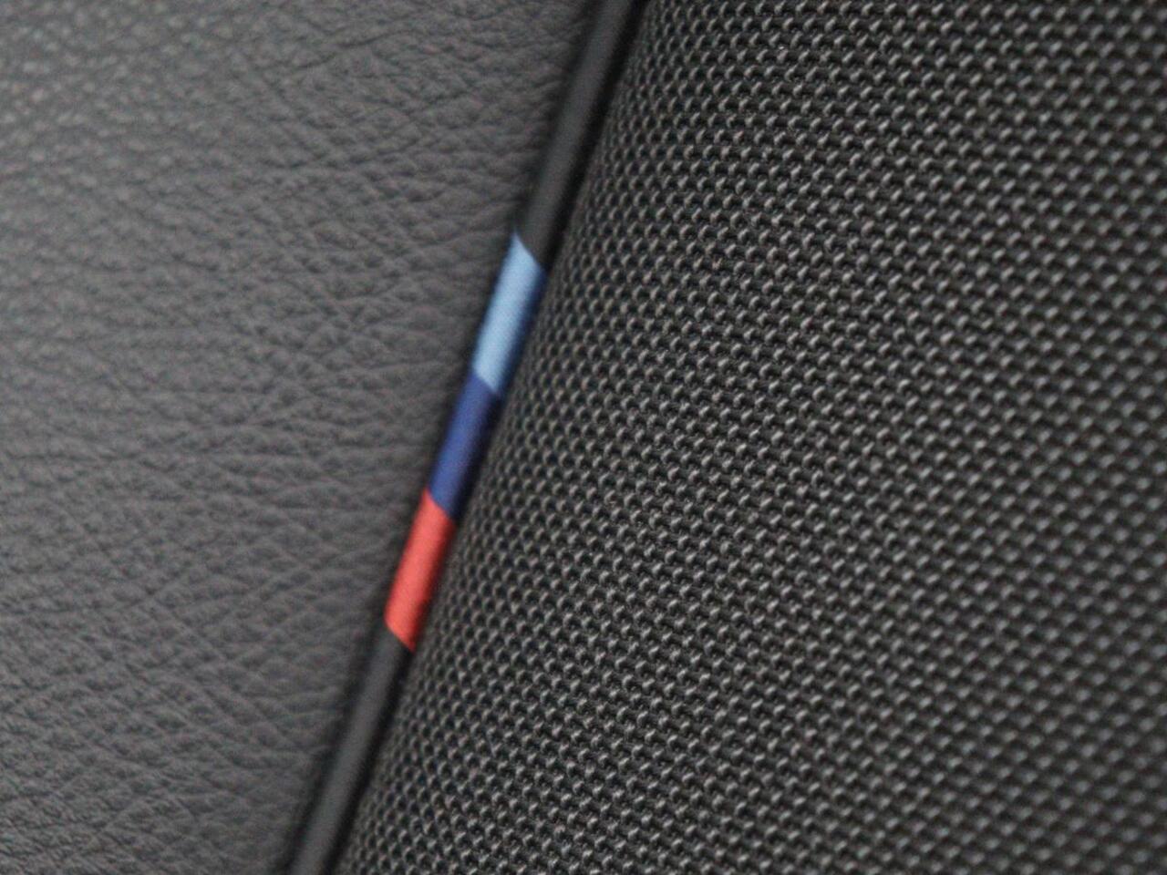 BMW 1-SERIE 128ti M Sport | 265pk | Panoramadak | Stoelverwarming | Carplay | Live Cockpit | Sportstoelen | Sfeerverlichting | Full LED | Parkeerhulp | Cruise control | Navigatie | Climate control