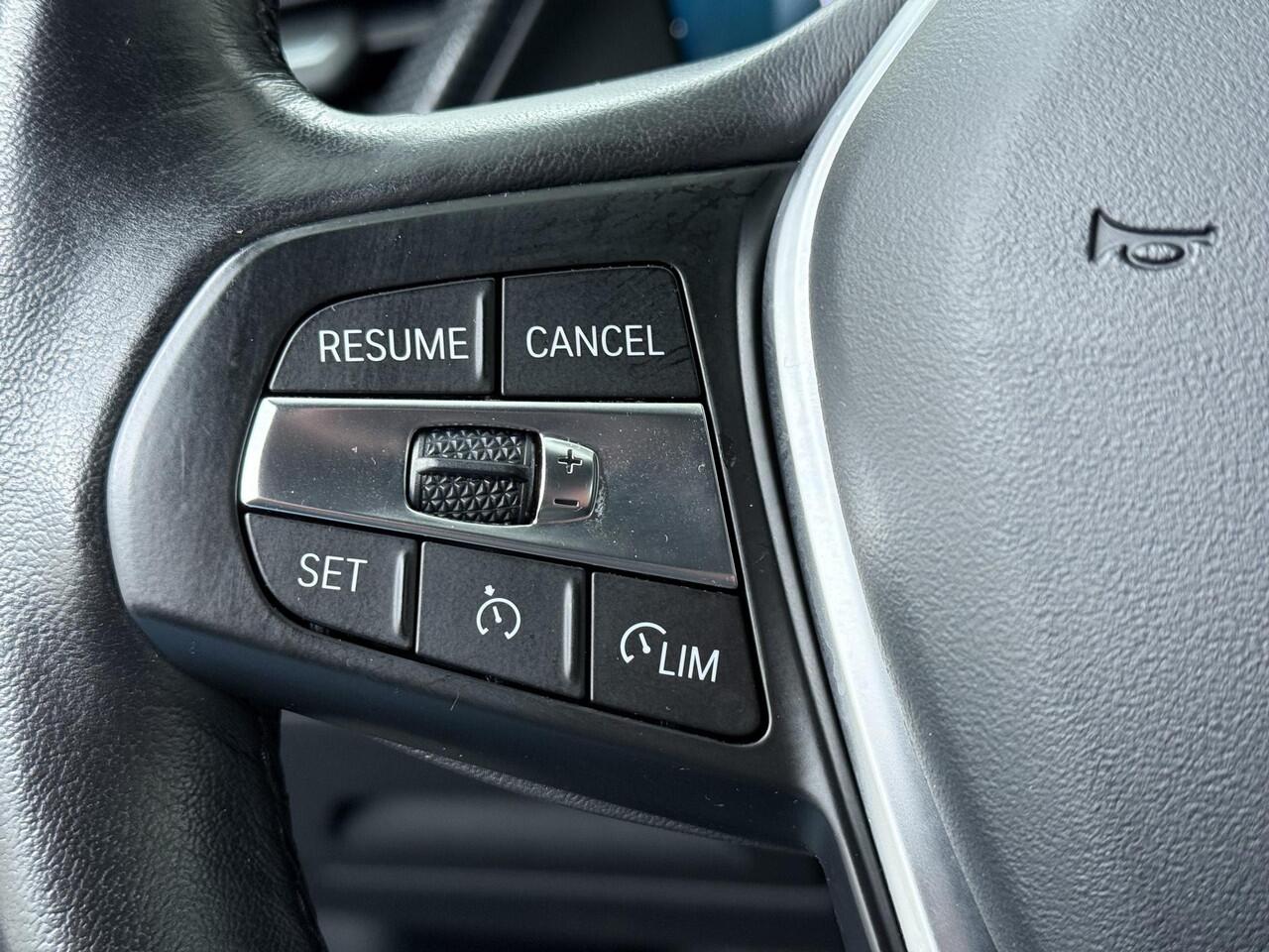 BMW 1-SERIE 118i Business Edition Plus | 136 PK | Automaat | Lederen bekleding | Achteruitrijcamera | Verwarmde voorstoelen | Cruise control |