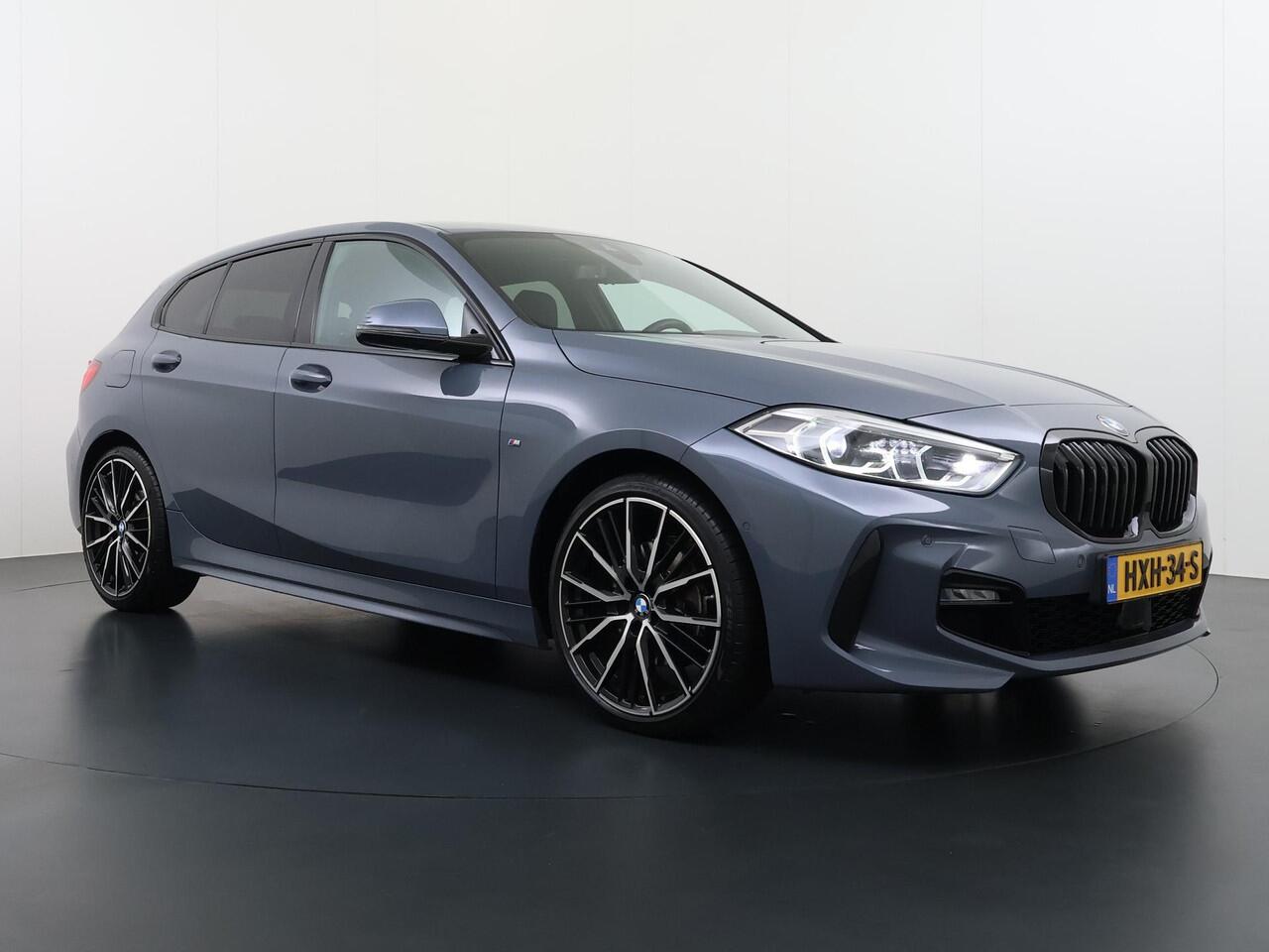 BMW 1-SERIE 118i Executive Edition M Sport VAN: ¤34.900,- VOOR: ¤29.877 UW EINDEJAARSVOORDEEL: ¤5.023,- | M SPORT | HARMAN & KARDON | ELEKTRISCHE ACHTERKLEP | CAMERA | ADAPTIVE CRUISE CONTROL | STOEL- & STUURVERWARMING | HEAD-UP | 19 INCH | INDIVIDUAL KLEUR STORM BAY