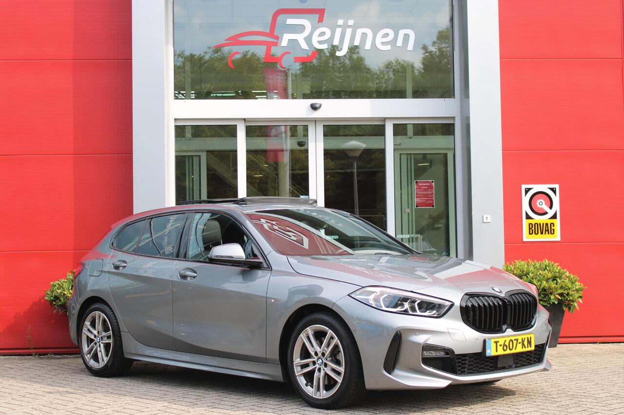 BMW 1-SERIE 118i 136PK M-SPORT EDITION | PANORAMISCH SCHUIF/KANTEL DAK | SFEER VERLICHTING | SHADOW LINE PAKKET | LEDEREN BEKLEDING "DAKOTA GEPERFOREERD" | VERWARMBARE VOORSTOELEN | LEDEREN M-SPORT STUUR | NAVIGATIE | ACHTERUITRIJCAMERA | PARKEERSENSOREN VOOR EN ACH