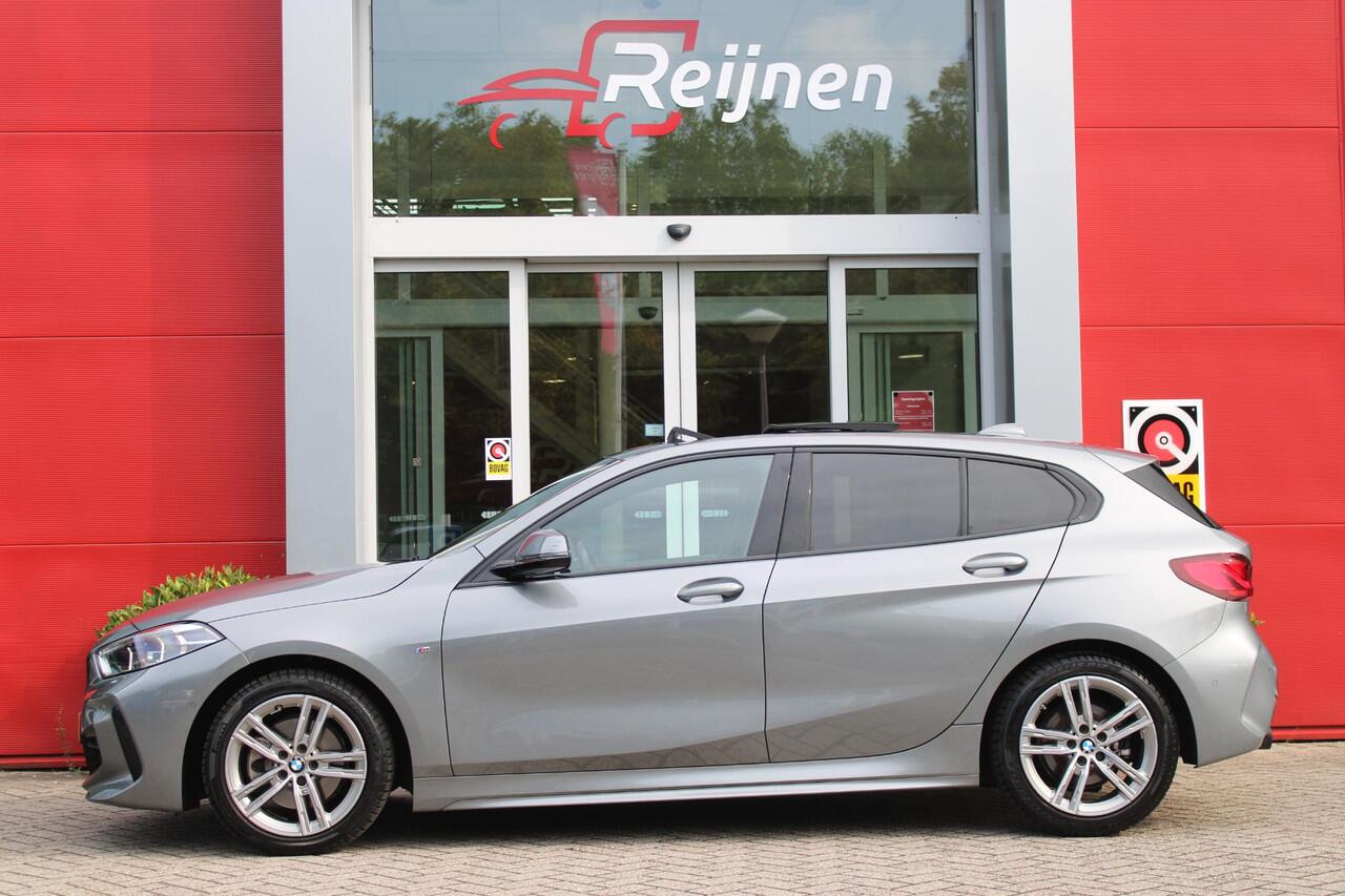 BMW 1-SERIE 118i 136PK M-SPORT EDITION | PANORAMISCH SCHUIF/KANTEL DAK | SFEER VERLICHTING | SHADOW LINE PAKKET | LEDEREN BEKLEDING "DAKOTA GEPERFOREERD" | VERWARMBARE VOORSTOELEN | LEDEREN M-SPORT STUUR | NAVIGATIE | ACHTERUITRIJCAMERA | PARKEERSENSOREN VOOR EN ACH