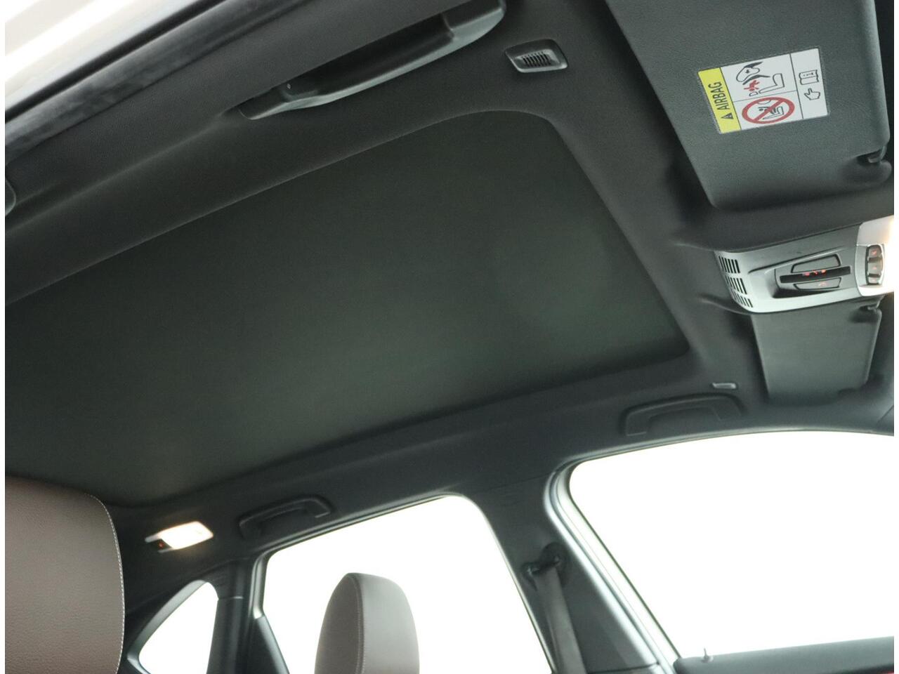 BMW 2-SERIE Active Tourer 218i High Executive |NAP |1e eigenaar | Automaat | Pano | HUD | Stoelverwarming | Camera