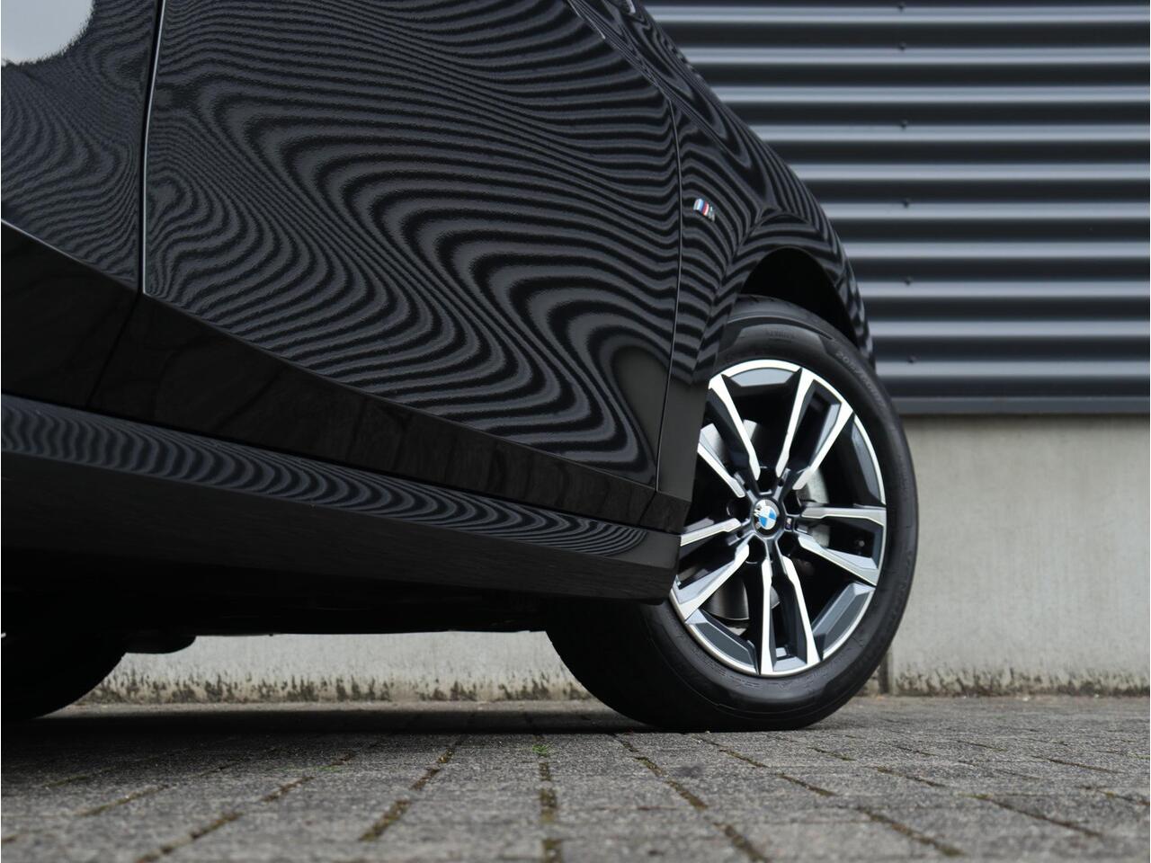 BMW 2-SERIE Active Tourer 218i | M Sportpakket | Trekhaak | Climate Control | Adaptief M Onderstel | Camera | Sportstoelen | LED | 17'' LMV