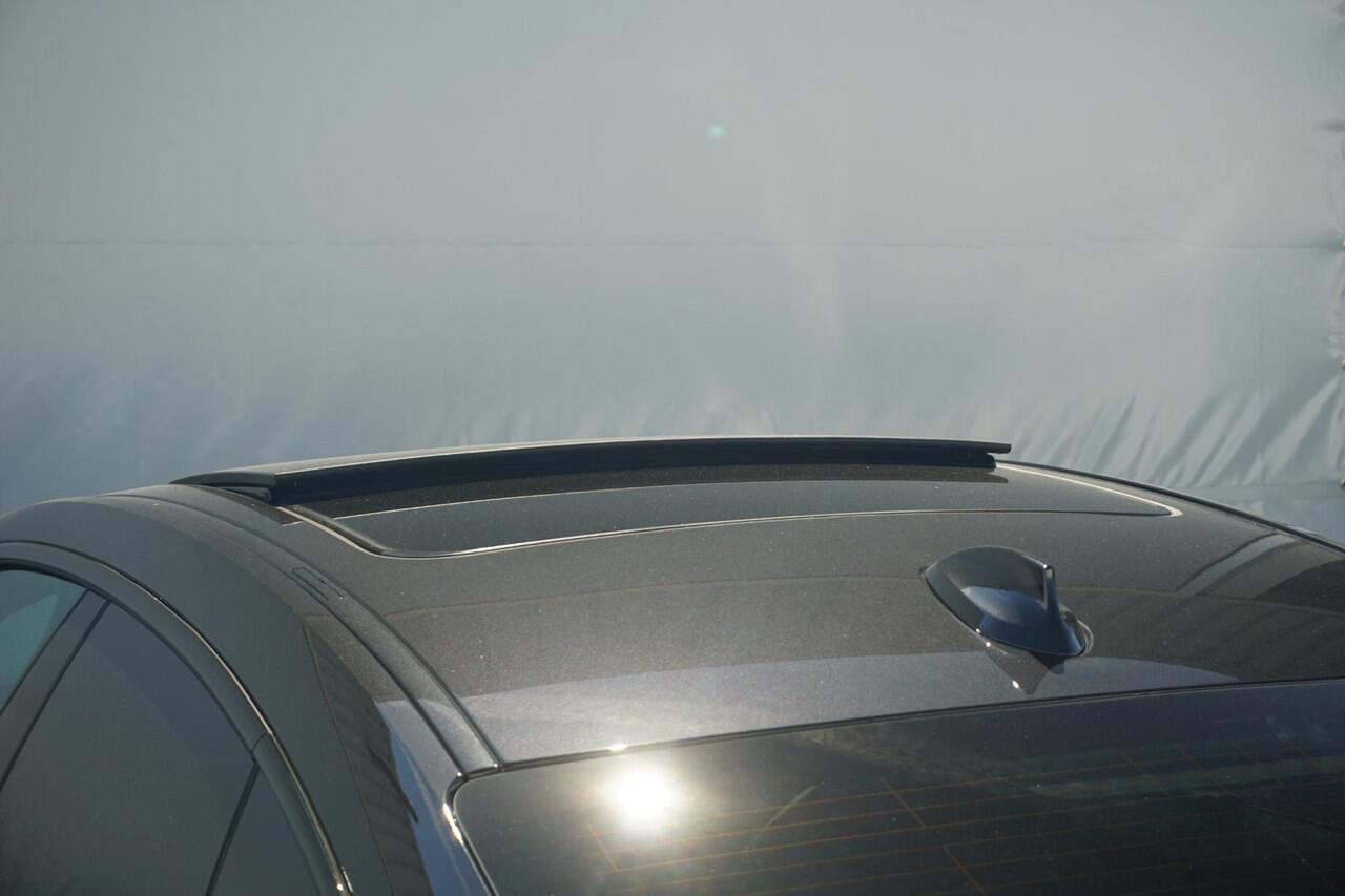 BMW 2-SERIE Gran Coupé M235 xDrive | Panoramadak / Head-up / Rondomzicht camera's / Elektrische Stoelen met geheugen / Comfort Access