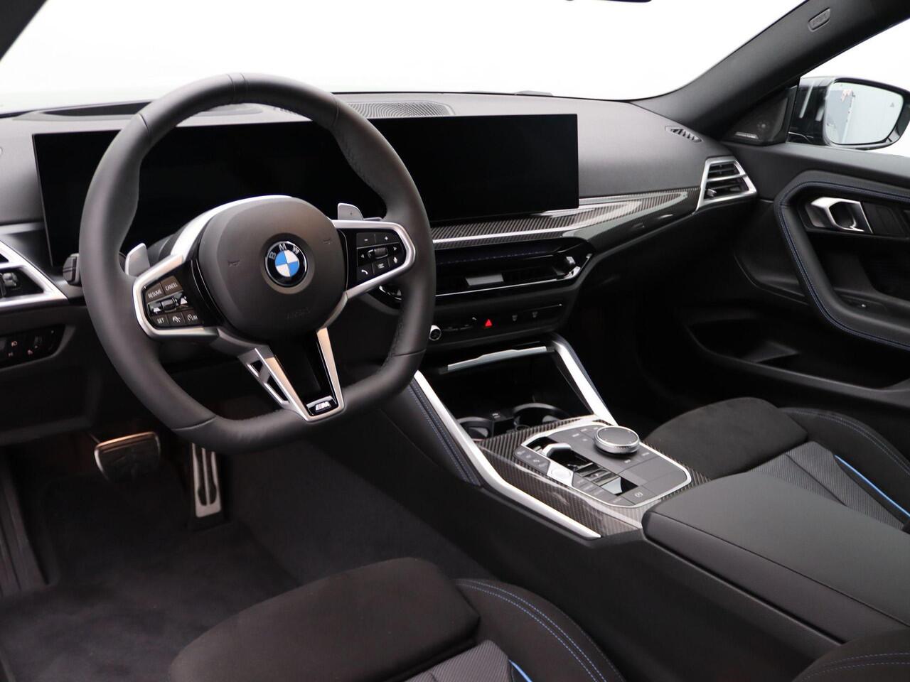BMW 2-SERIE Coupé 220i High Executive | M Sportpakket Pro | Innovation Pack | Premium Pack | Stuurwielrand Verwarmd | Comfort Access | Schuifdak | Elektrisch Verstelbare Sportstoelen | Active Cruise Control | Harman Kardon | 19'' | Ekris Selection