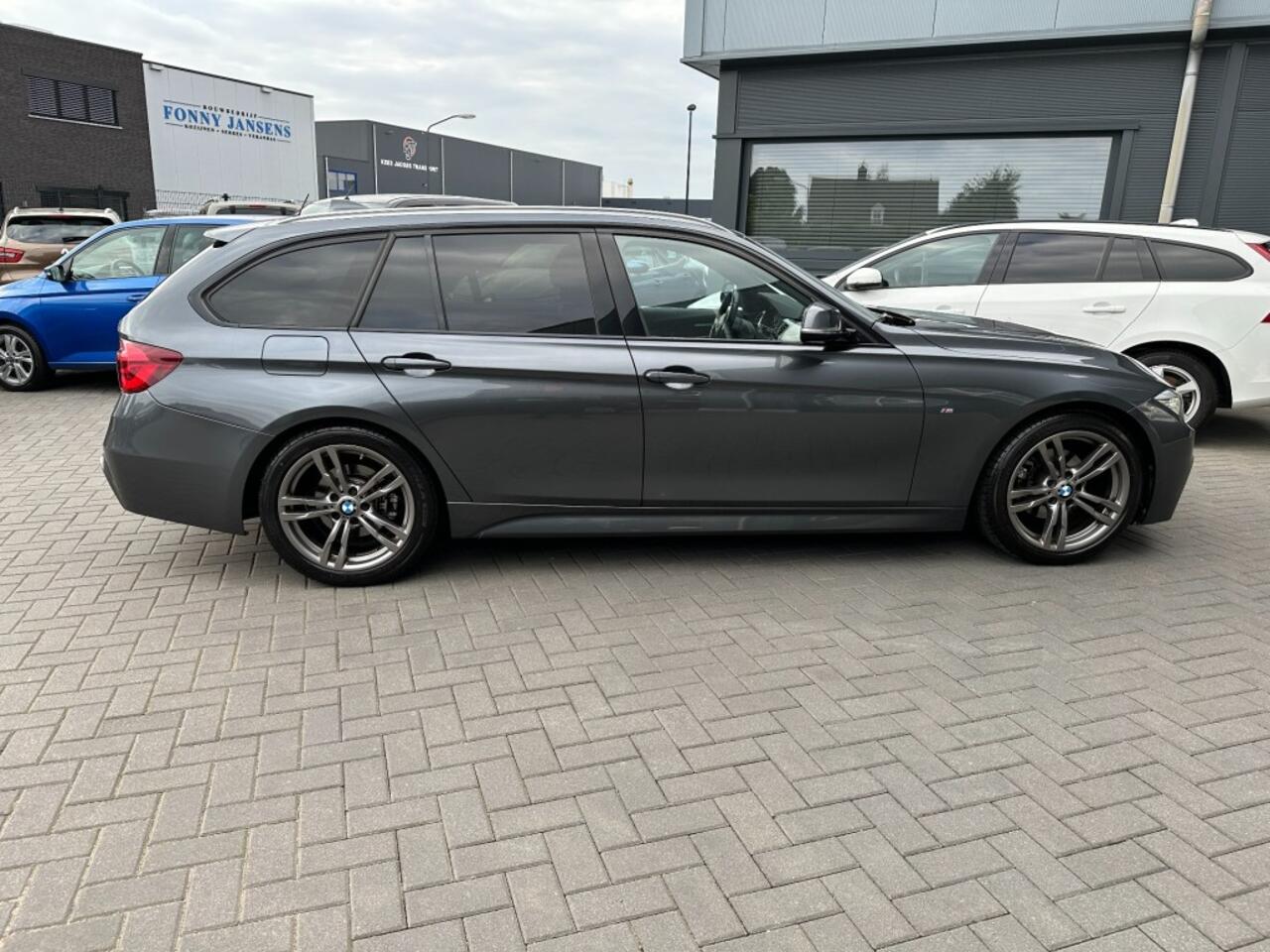 BMW 3-SERIE 320i Touring M-Sport High Executive 184PK Leder Trekhaak