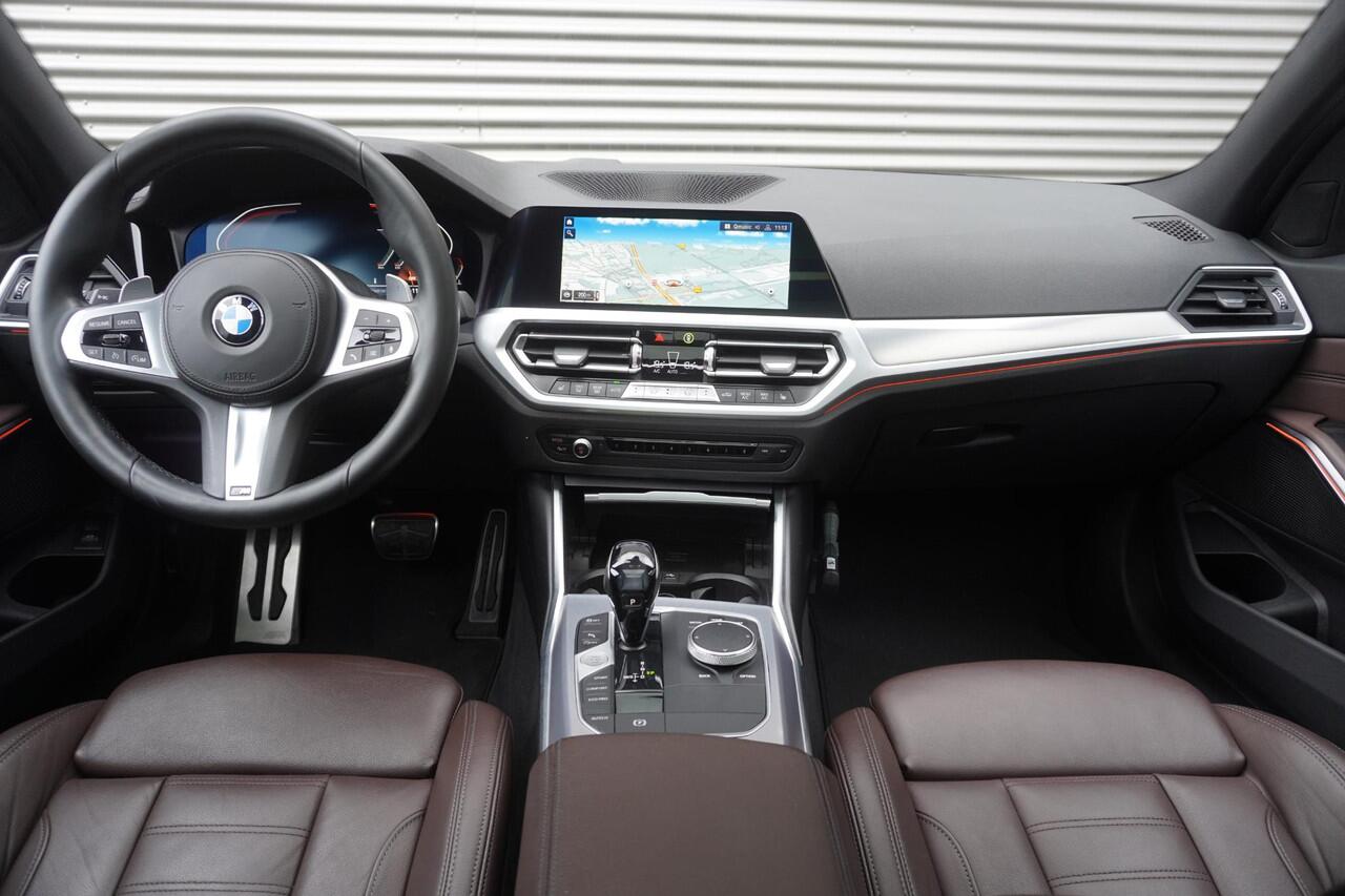 BMW 3-SERIE Touring 330i High Executive | Glazen panoramadak | Achteruitrijcamera | HiFi System | Elektrisch verwarmde voorstoelen