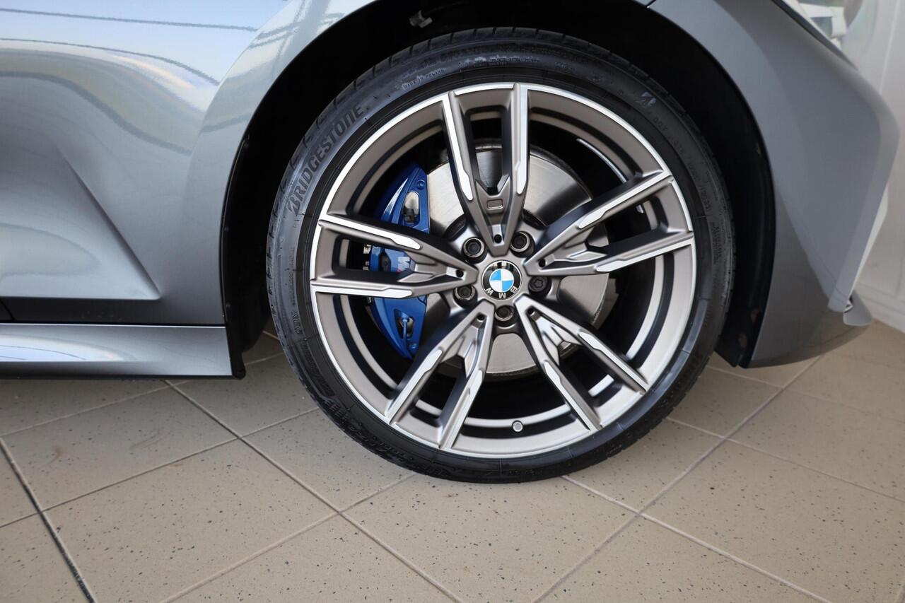 BMW 3-SERIE Sedan M340i xDrive | Head-Up | HiFi | Parkeersensoren | Head - Up Display | Cruise Control | Lentevoordeel