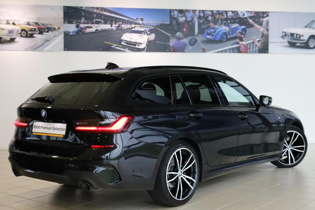 BMW 3-SERIE Touring 318i High Executive | M Sport | Elektrische Trekhaak | Glazen panoramadak | Achteruitrijcamera | HiFi | Shadowline