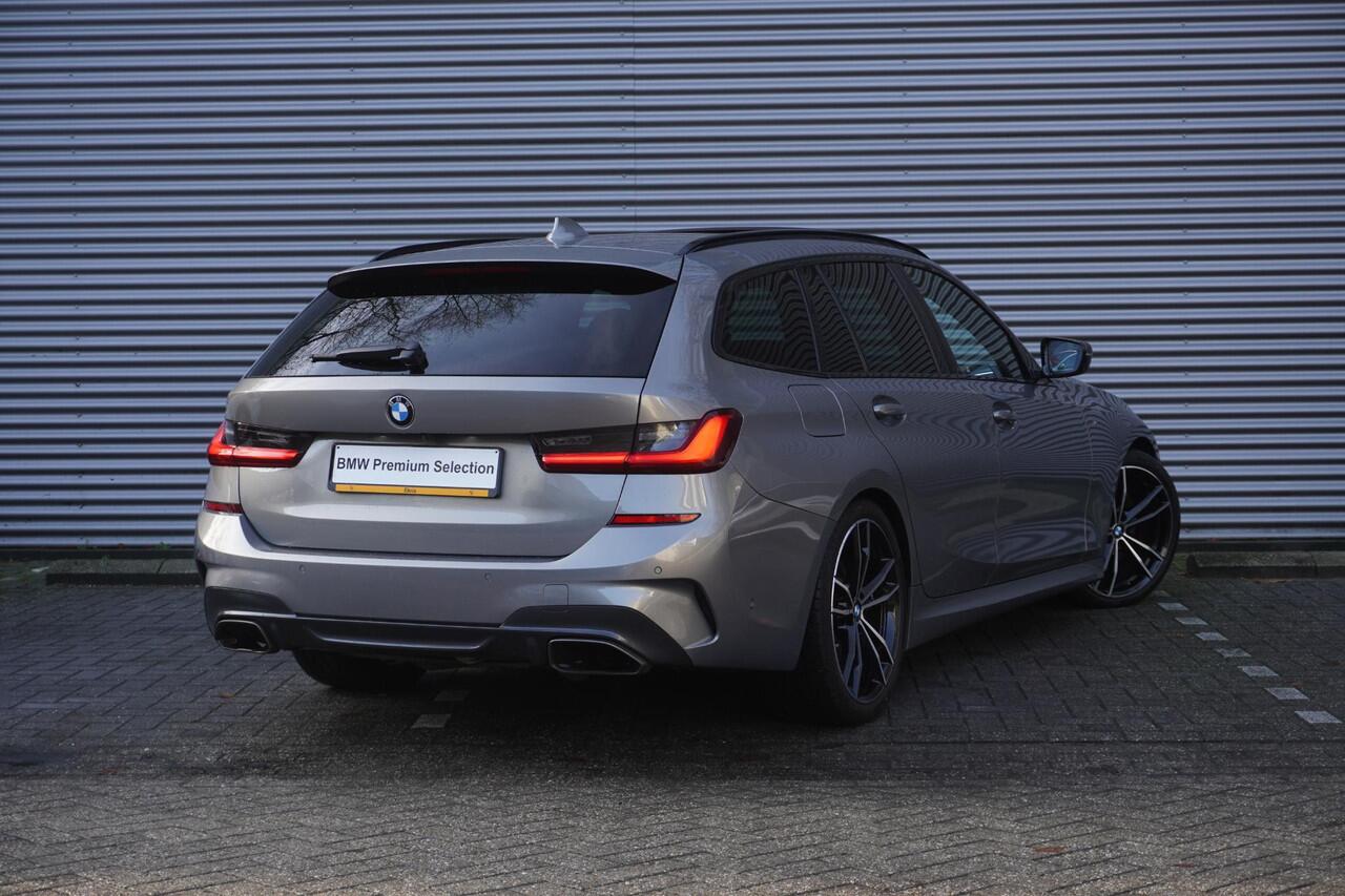 BMW 3-SERIE Touring M340i xDrive High Executive | Parking Pack | Glazen panoramadak | HiFi System | Trekhaak met elektrisch wegklapbare kogel | BMW Head-Up Display