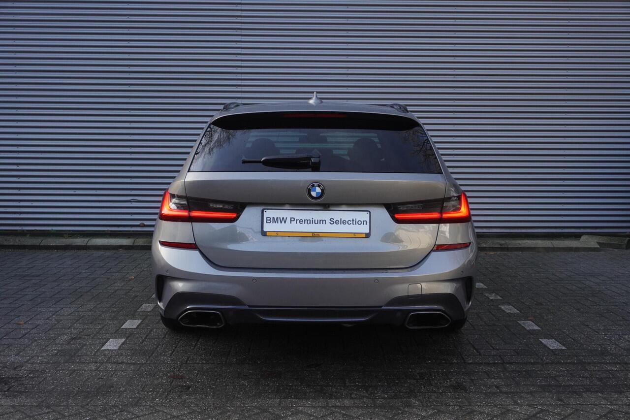 BMW 3-SERIE Touring M340i xDrive High Executive | Parking Pack | Glazen panoramadak | HiFi System | Trekhaak met elektrisch wegklapbare kogel | BMW Head-Up Display