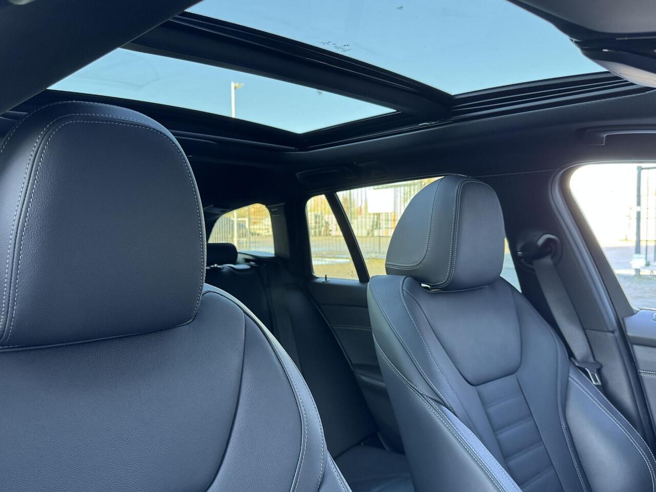 BMW 3-SERIE TOURING 320i HIGH EXECUTIVE EDITION I SPORTLINE I SCHUIFDAK I LEDEREN BEKLEDING I STOELVERWARMING
