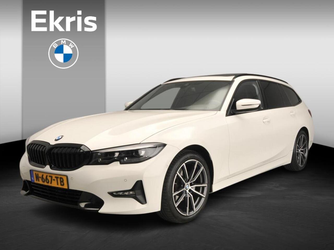 BMW 3-SERIE Touring 318i | LED | Navigatie | Schuifdak | Trekhaak | Shadow line | DAB | Hifi speakers | Alu 18 inch