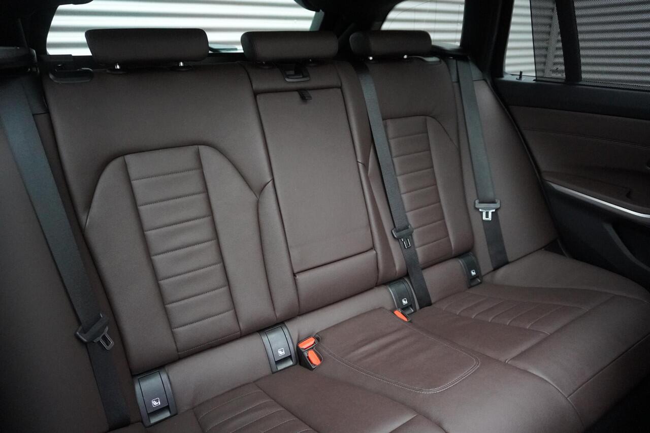 BMW 3-SERIE Touring 320e M Sportpakket | Alarmsysteem klasse 3 | Trekhaak met elektrisch wegklapbare kogel | Glazen panoramadak | HiFi System | Driving Assistant