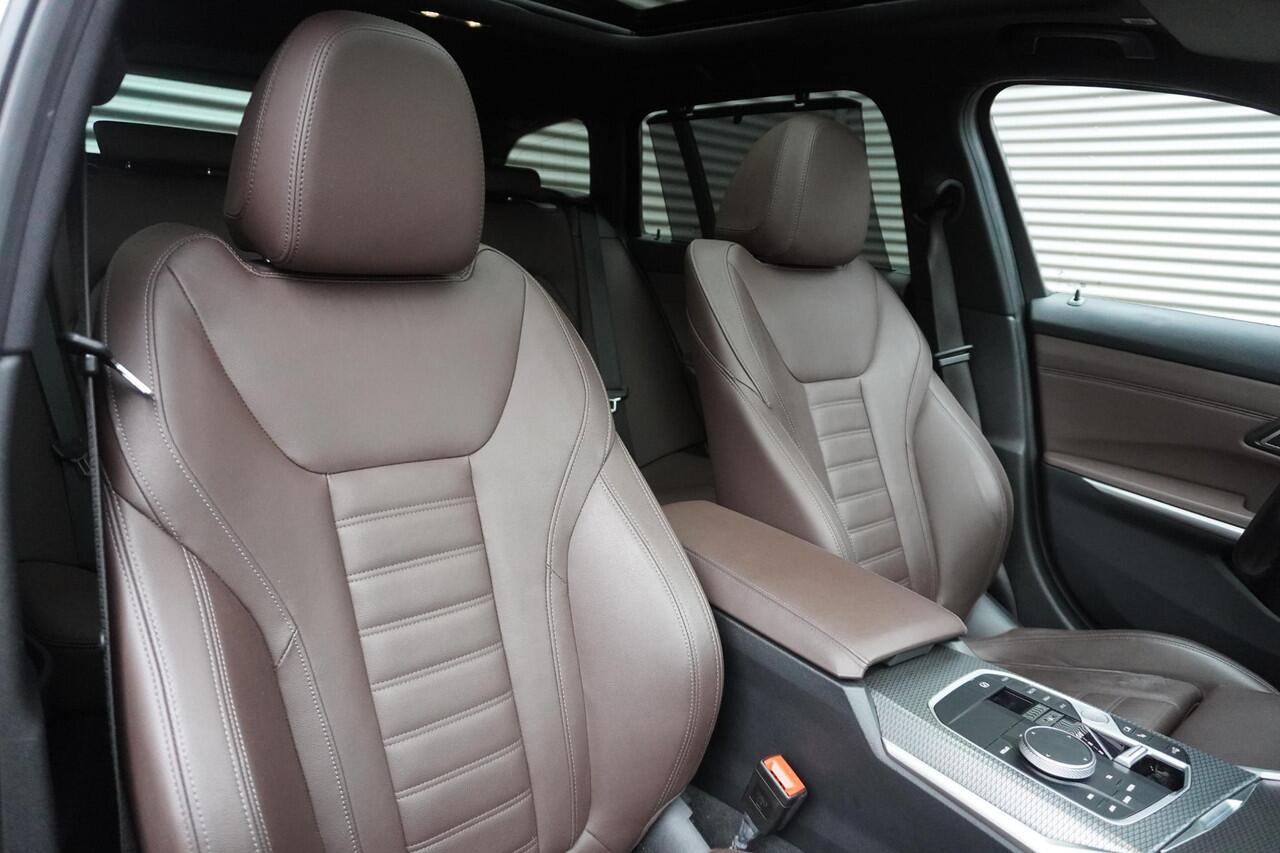 BMW 3-SERIE Touring 320e M Sportpakket | Alarmsysteem klasse 3 | Trekhaak met elektrisch wegklapbare kogel | Glazen panoramadak | HiFi System | Driving Assistant