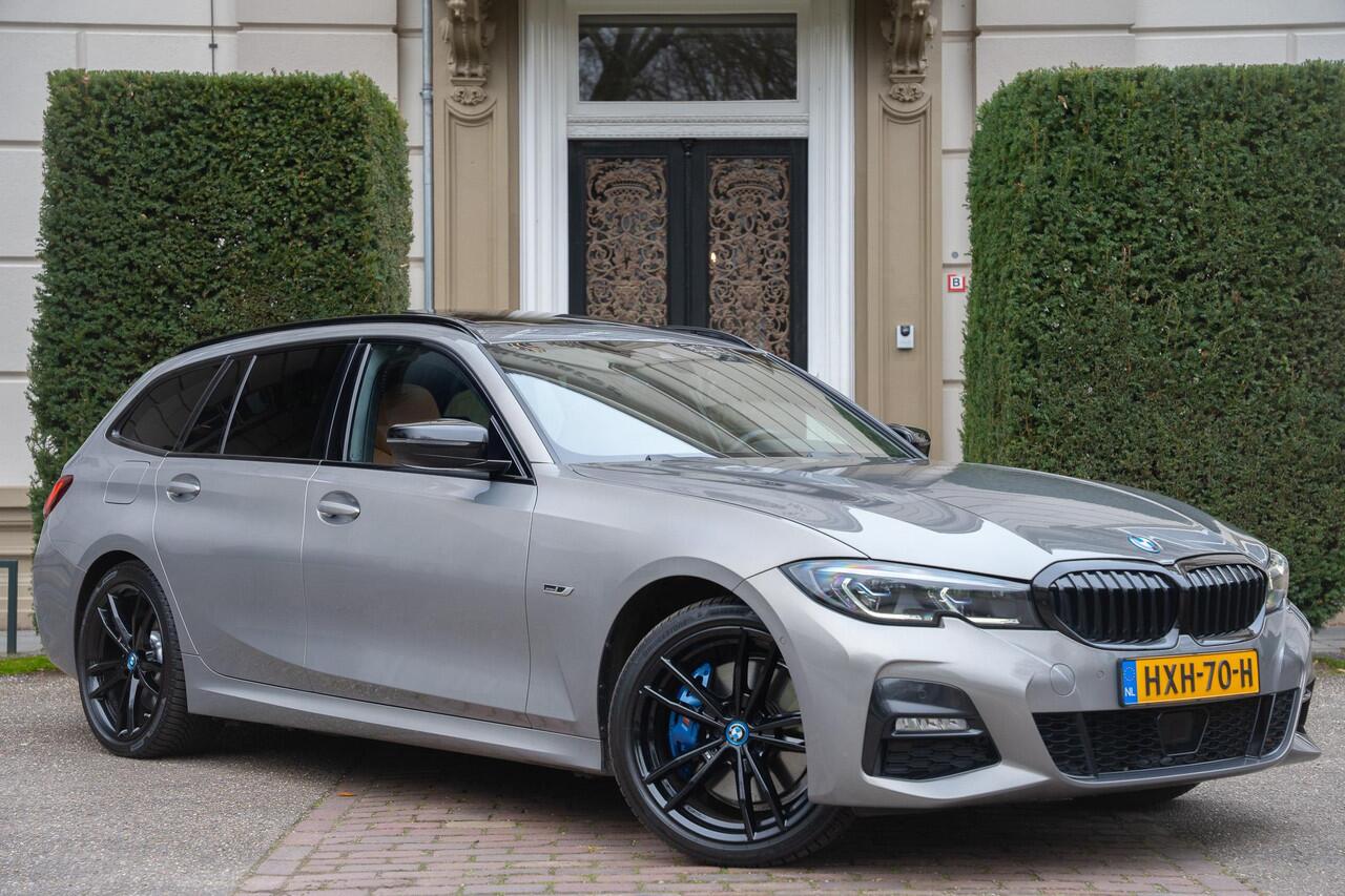 BMW 3-SERIE Touring 330e High Executive TREKHAAK | PANO | KUIPSTOELEN | LASER | ACC | H&K