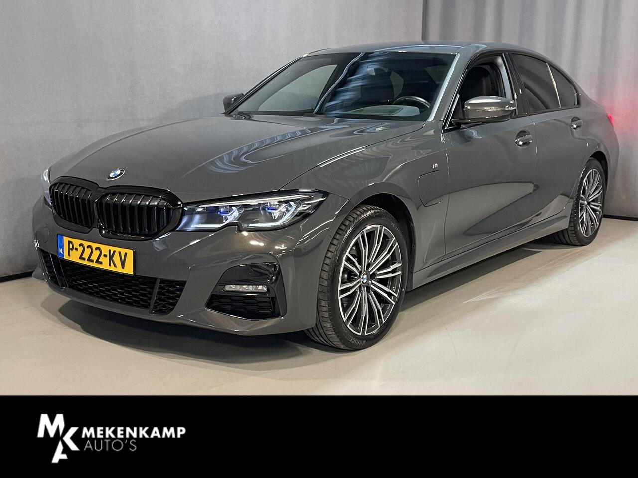 BMW 3-SERIE 320e High Executive 18"/Leder/Laser LED/Stuur + stoelverwarming/Dodehoek/Elektrische klep/Trekhaak/Hed-up/Keyless