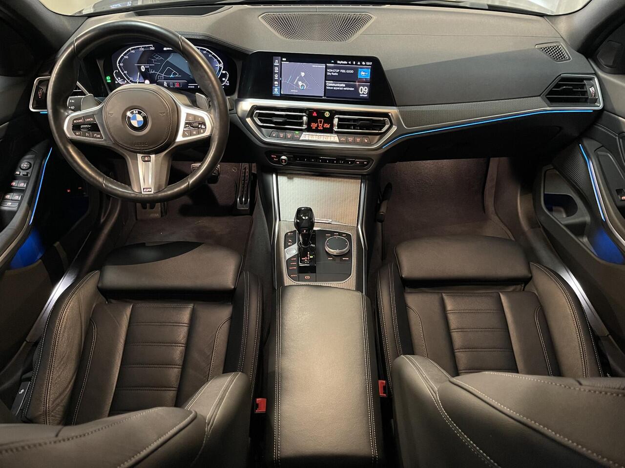 BMW 3-SERIE 320e High Executive 18"/Leder/Laser LED/Stuur + stoelverwarming/Dodehoek/Elektrische klep/Trekhaak/Hed-up/Keyless
