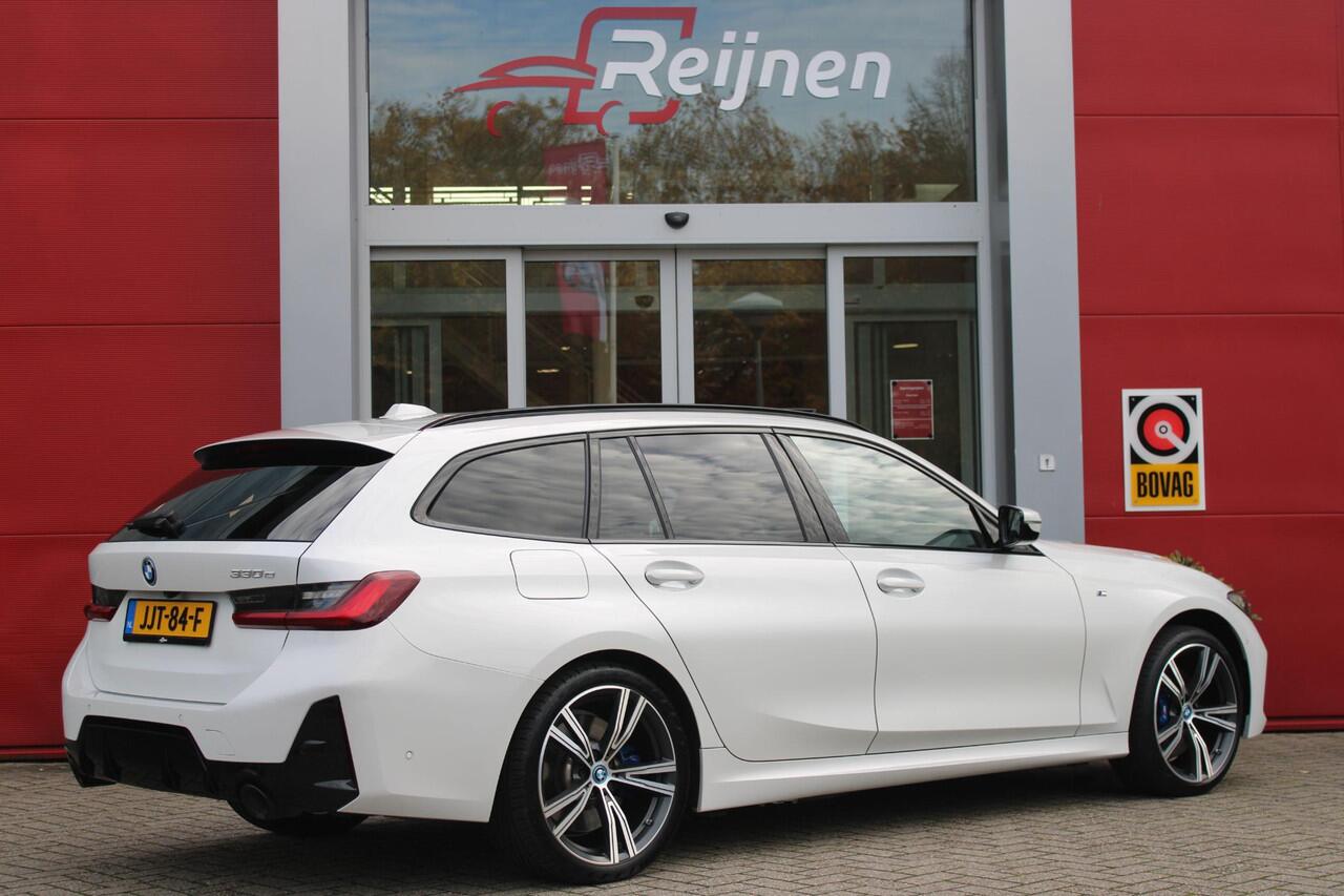 BMW 3-SERIE Touring 330e 292PK M-SPORT | M-SPORT PRO-PAKKET | M-SPORT REMMEN UITGEVOERD IN DONKERBLAUW MET M LOGO | BMW LIVE COCKPIT PROFESSIONAL | CURVED DISPLAY |DRIVING ASSISTANT INCL. HEAD-UP DISPLAY | PANORAMISCH SCHUIF/KANTEL DAK | PARKING ASSIST INCL. ACHTERUI