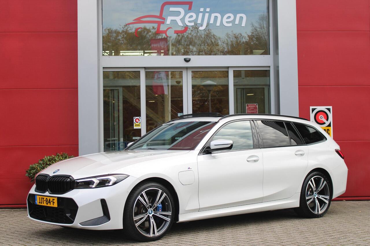 BMW 3-SERIE Touring 330e 292PK M-SPORT | PANORAMISCH SCHUIF/KANTEL DAK | M-SPORT PRO-PAKKET | M-SPORT REMMEN UITGEVOERD IN DONKERBLAUW MET M LOGO | BMW LIVE COCKPIT PROFESSIONAL | CURVED DISPLAY |DRIVING ASSISTANT INCL. HEAD-UP DISPLAY | PARKING ASSIST INCL. ACHTERUI