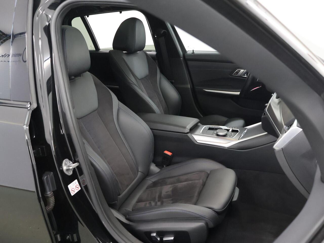 BMW 3-SERIE Touring 320e M-Sport | Facelift | Panoramadak | Elek. Stoelen met Geheugen | HUD | Sportstoelen | 360° Camera | Apple Carplay/Android Auto | Cruise Control | Comfort Pakket | M-Sport Pro | Curved Display |