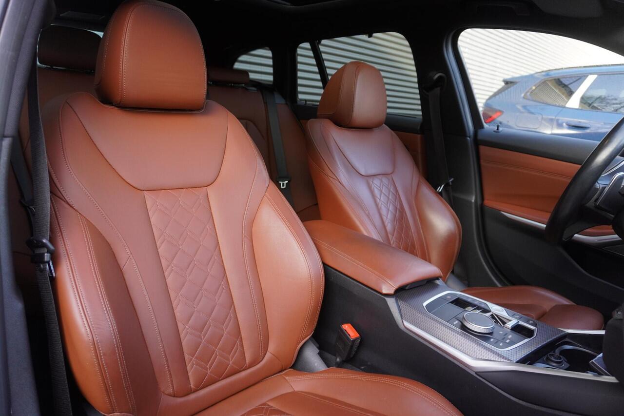 BMW 3-SERIE Touring M340i xDrive Comfort Pack | Trekhaak met elektrisch wegklapbare kogel | Glazen panoramadak | HIFI System Harman Kardon | Adaptieve LED koplampen